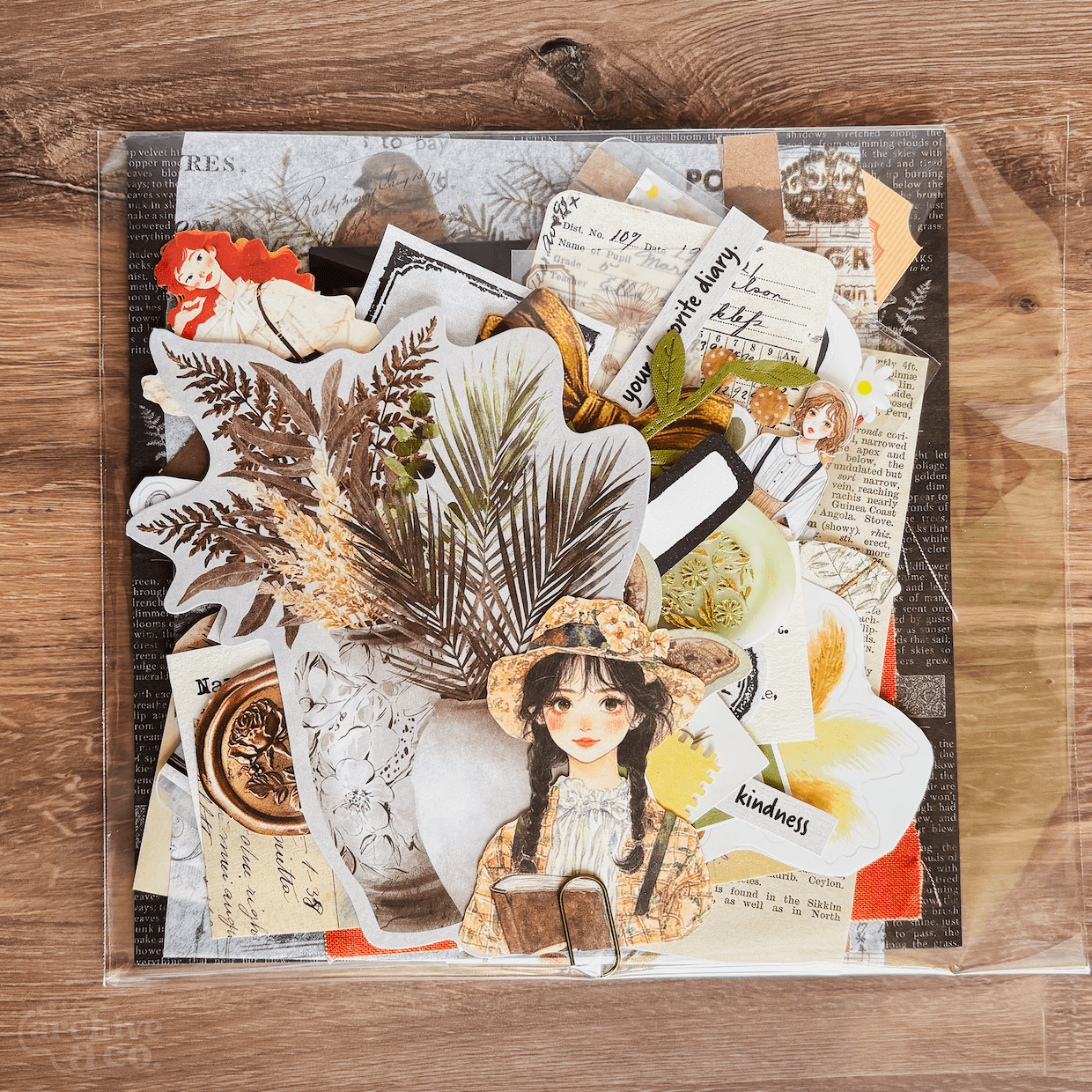 nature and adventure junk journal supplies with botanical ephemera, illustrated animals, colorful paper pieces, stickers, and decorative elements