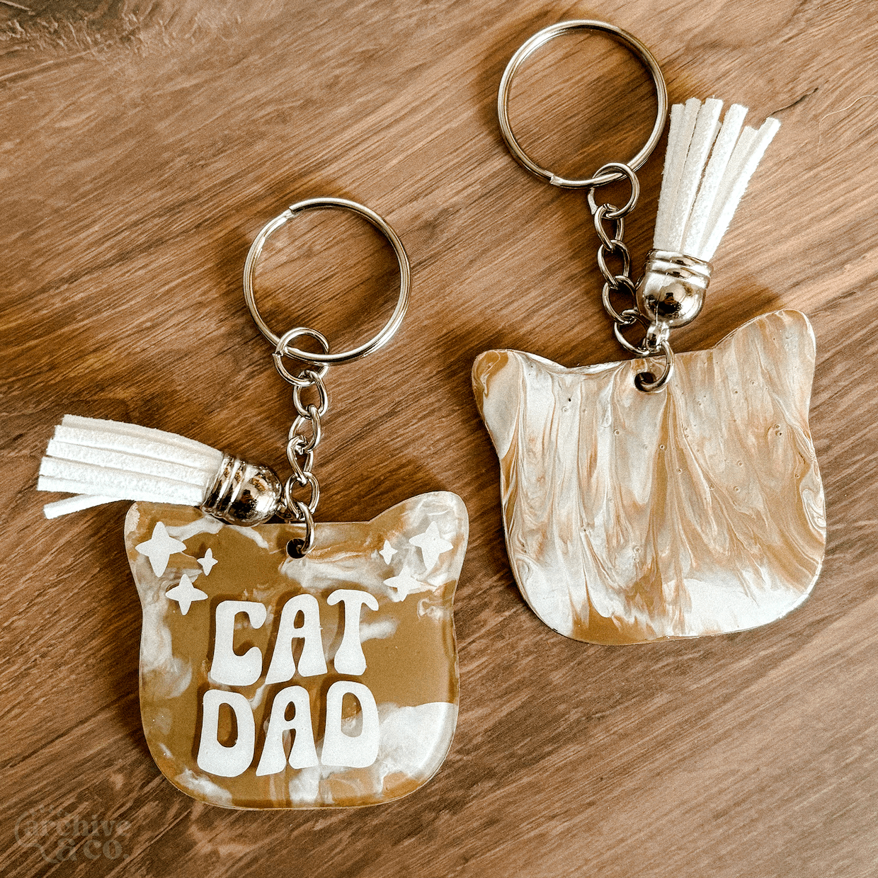 2026_rosearchive_catdad-keychain_brw2.png
