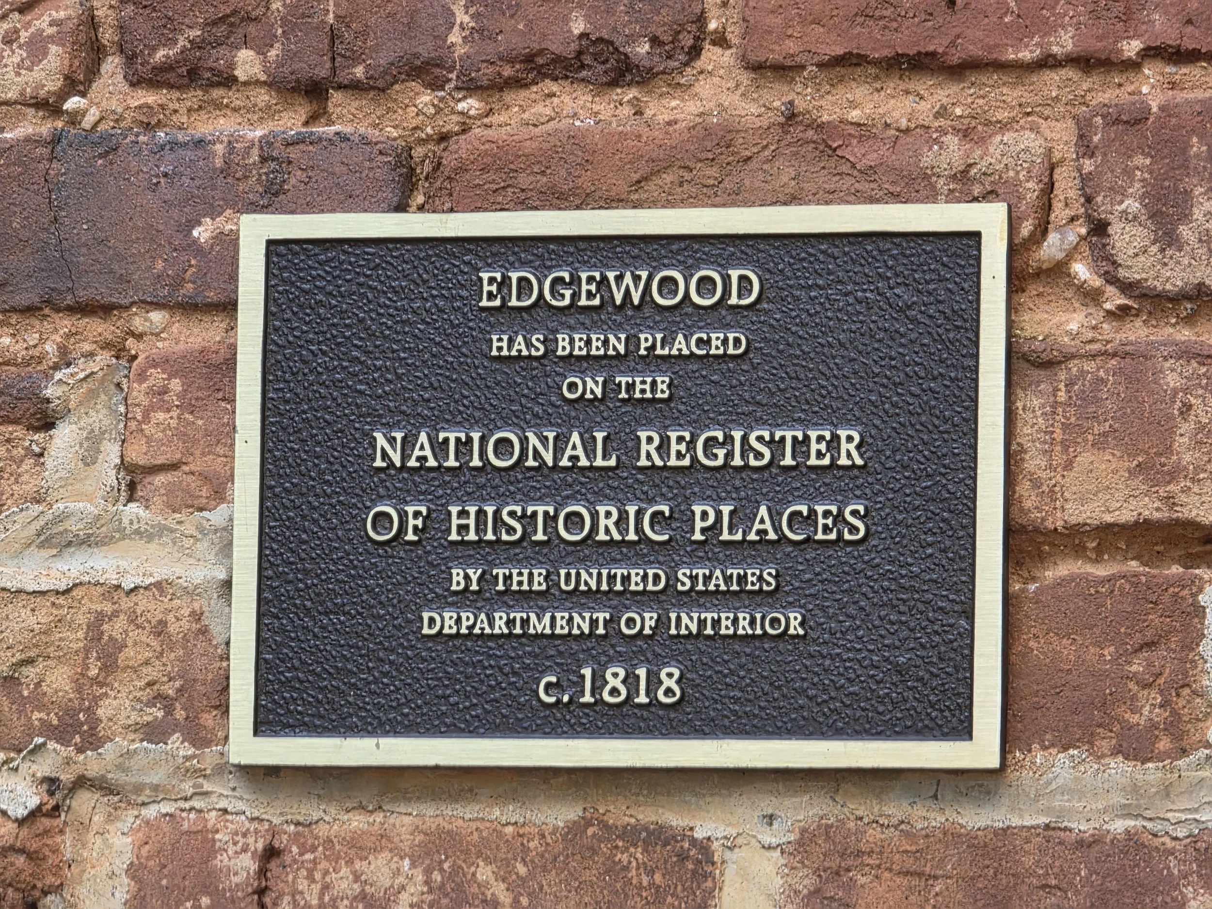 The historic plaque at Edgewood in Amherst, VA, showing its place on the National Register of Historic Places, circa 1818.
