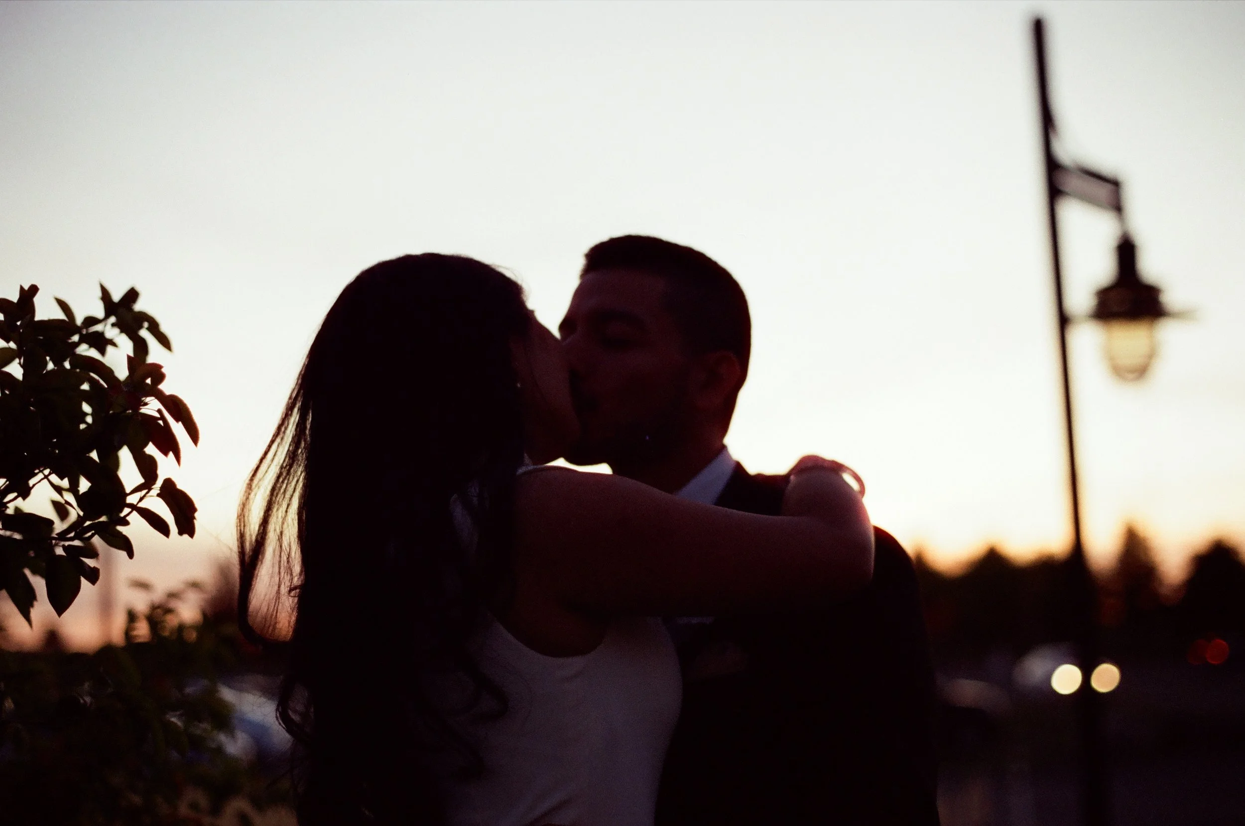 Theodora & Alejandro's Wedding - Shot with CineStill 200D - indoors and outdoors, ambient lighting only

Lo-fi colour cast with red halation