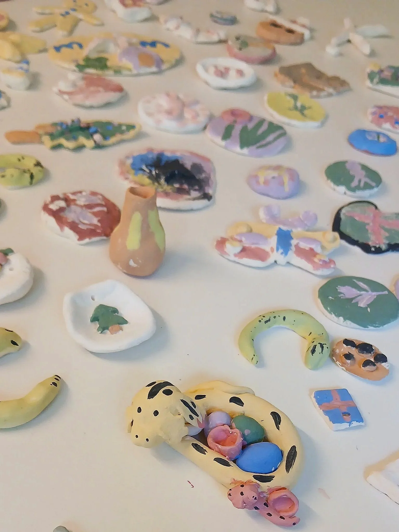 Ornaments made from stonewear clay before bisque firing on kiln