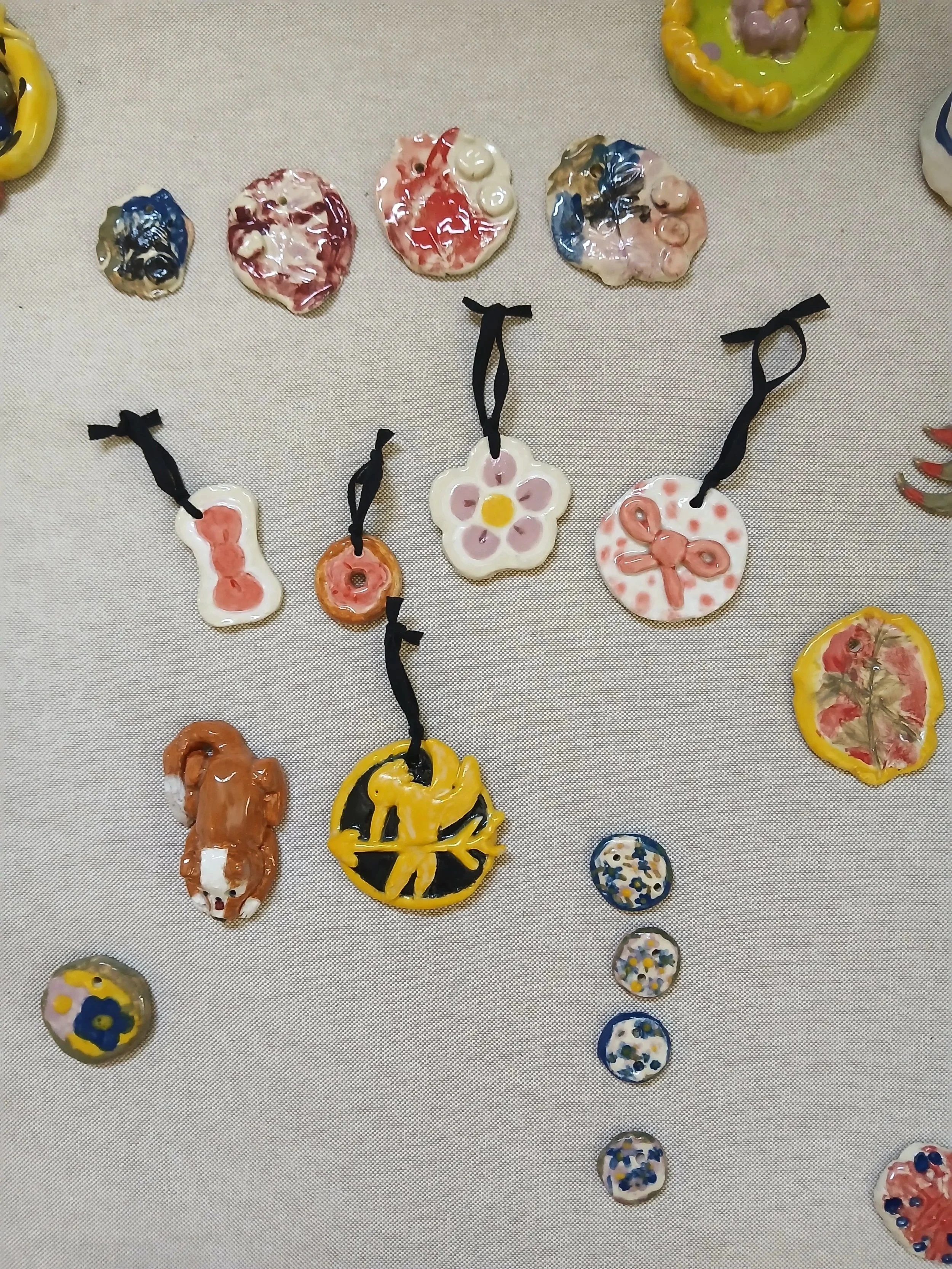 Ornaments made with stonewear clay, glazed.