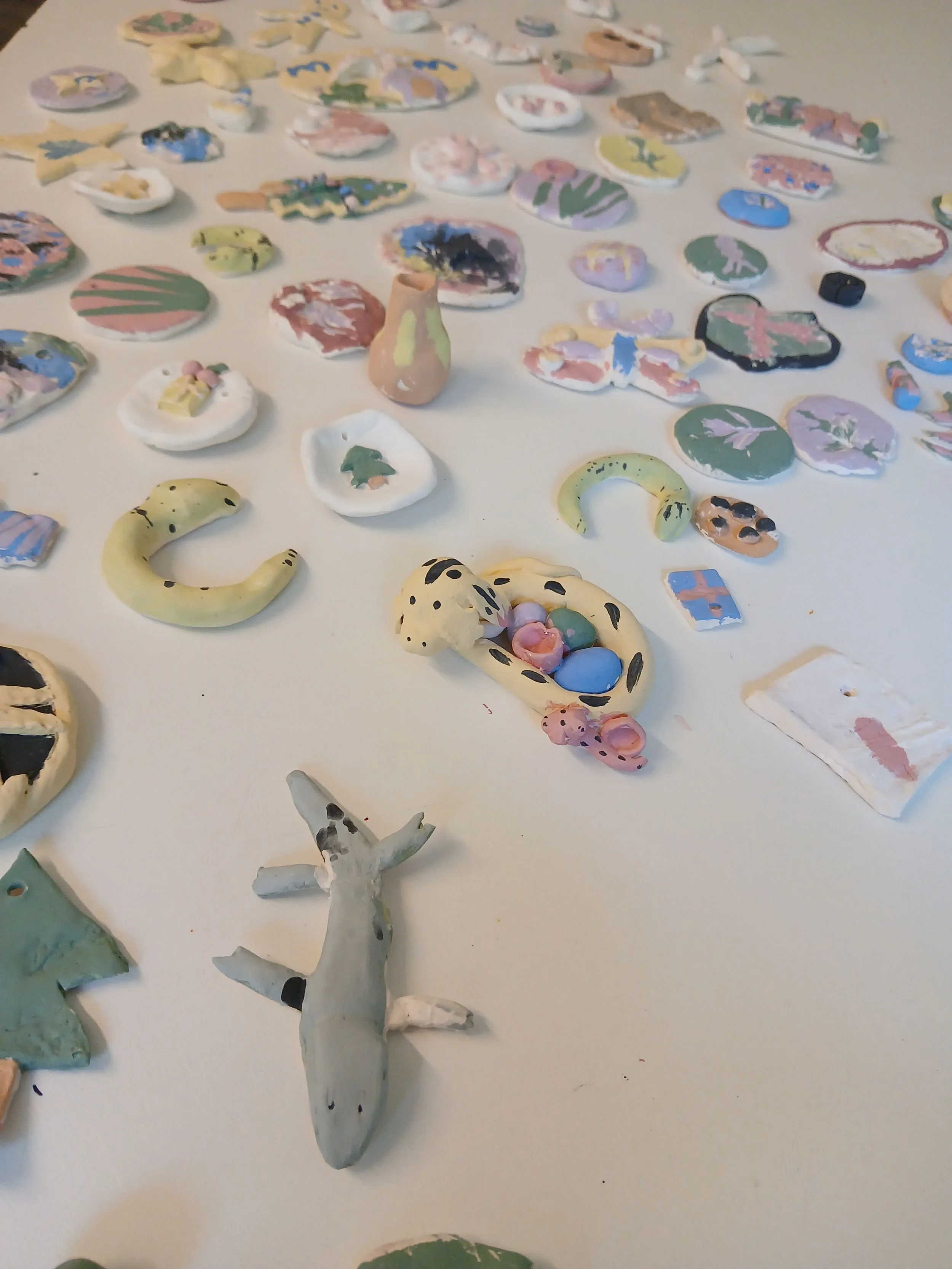 Ornaments made from stonewear clay before bisque firing on kiln