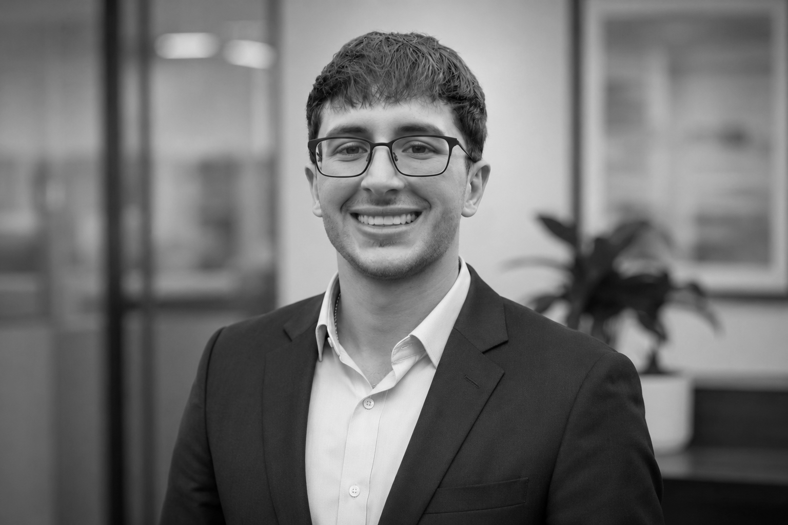 Headshot image of Forge + Field Strategies Principal Gage Schmid