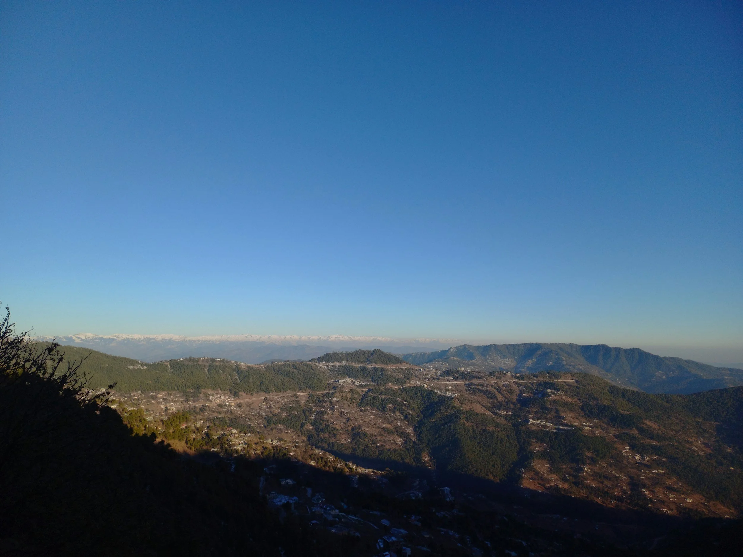 expansive panoramic landscape photo of mountains and big sky of the Andalucian countryside.