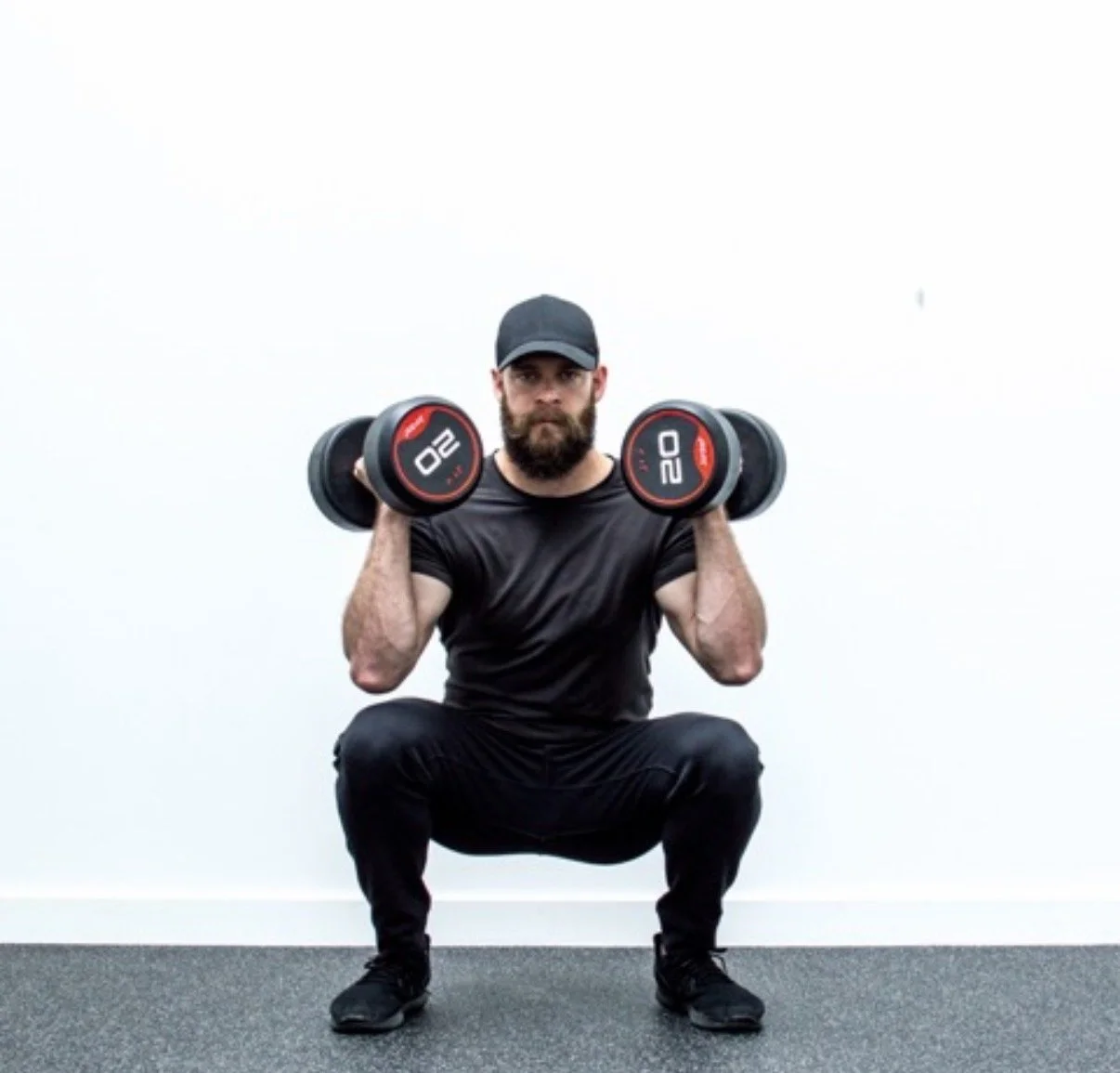 Gavin doing a squat/press