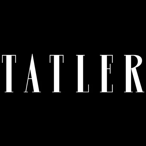 The word 'TATLER' in white capital letters on a black background.