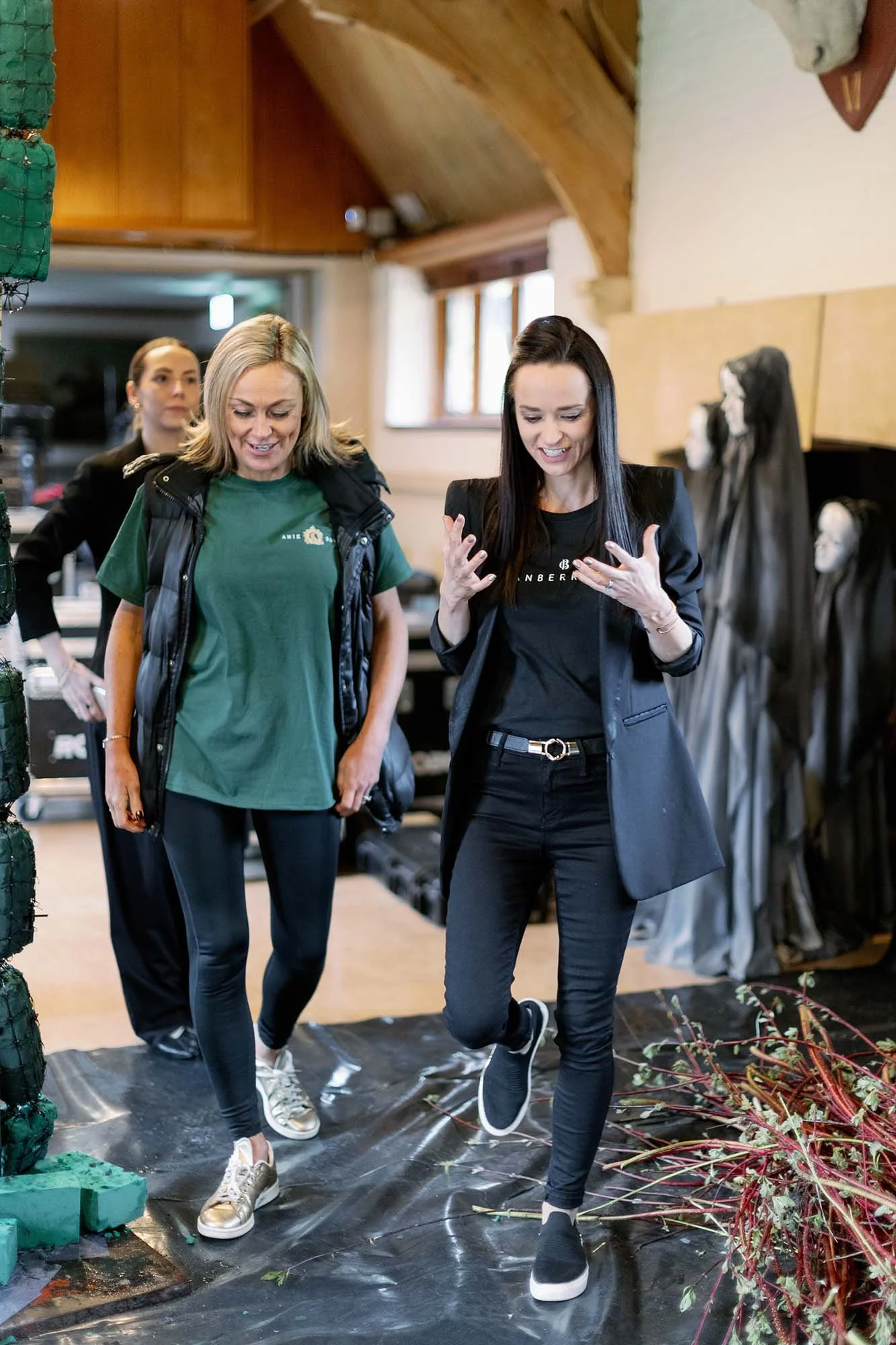 Melanie of Cranberry Blue working with a supplier to set up a wedding reception.