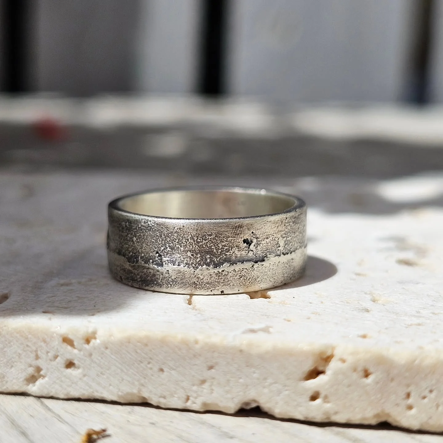 The grooms band - I made a test ring in sterling silver as we needed to try a half size. This then became the pattern I used to sand cast from. It took me a fair few attempts to get this just right. I added sand to the mix to get the texture so each 
