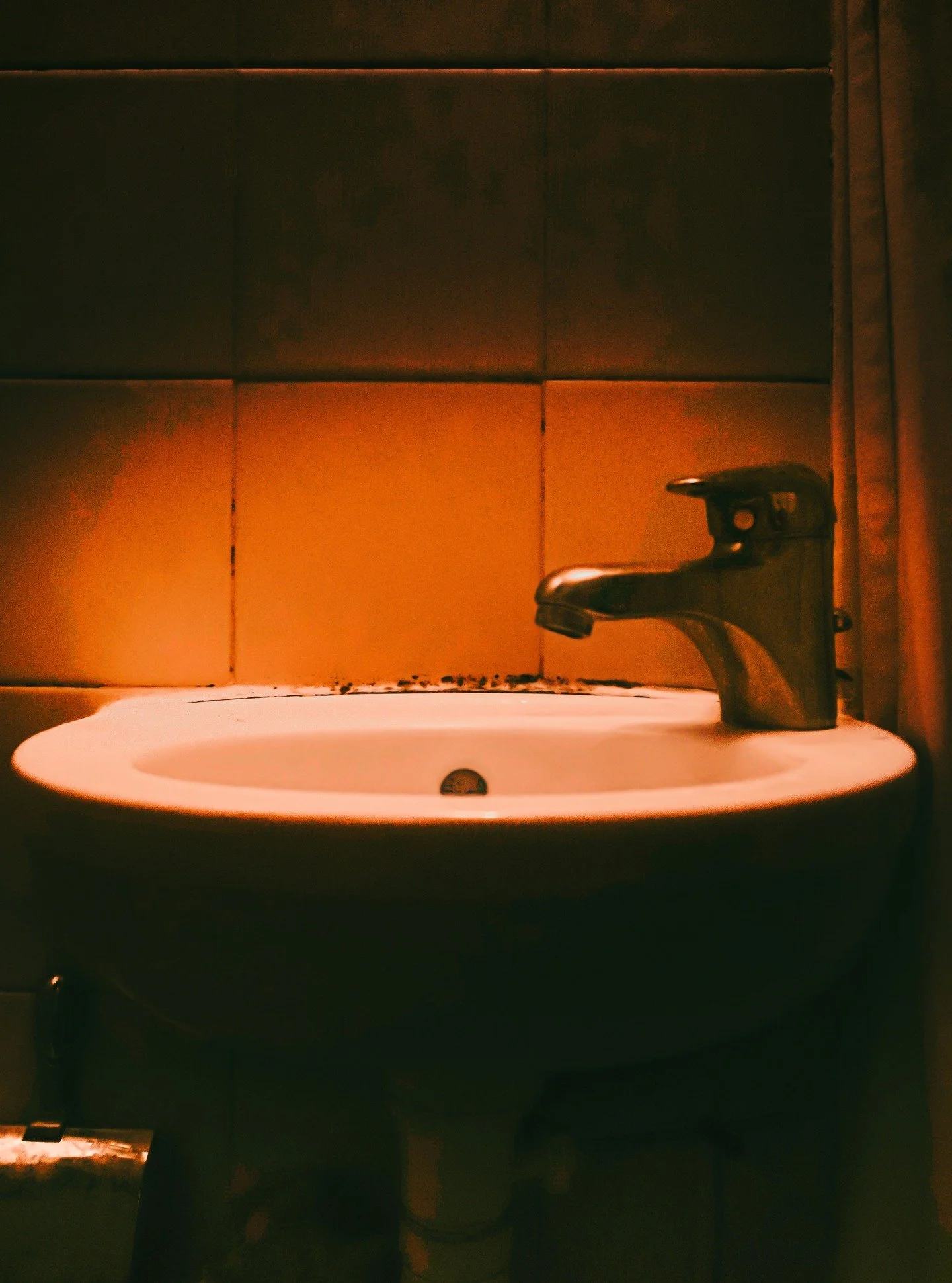 A simple sink!

Sometimes beauty hides in the most ordinary places, waiting for the eye to notice.

#cinematicphotography #moodphotography #darkaesthetic #noirvibes #urbanexploration #artphotography #conceptualphotography #moodygrams #visualart #mood