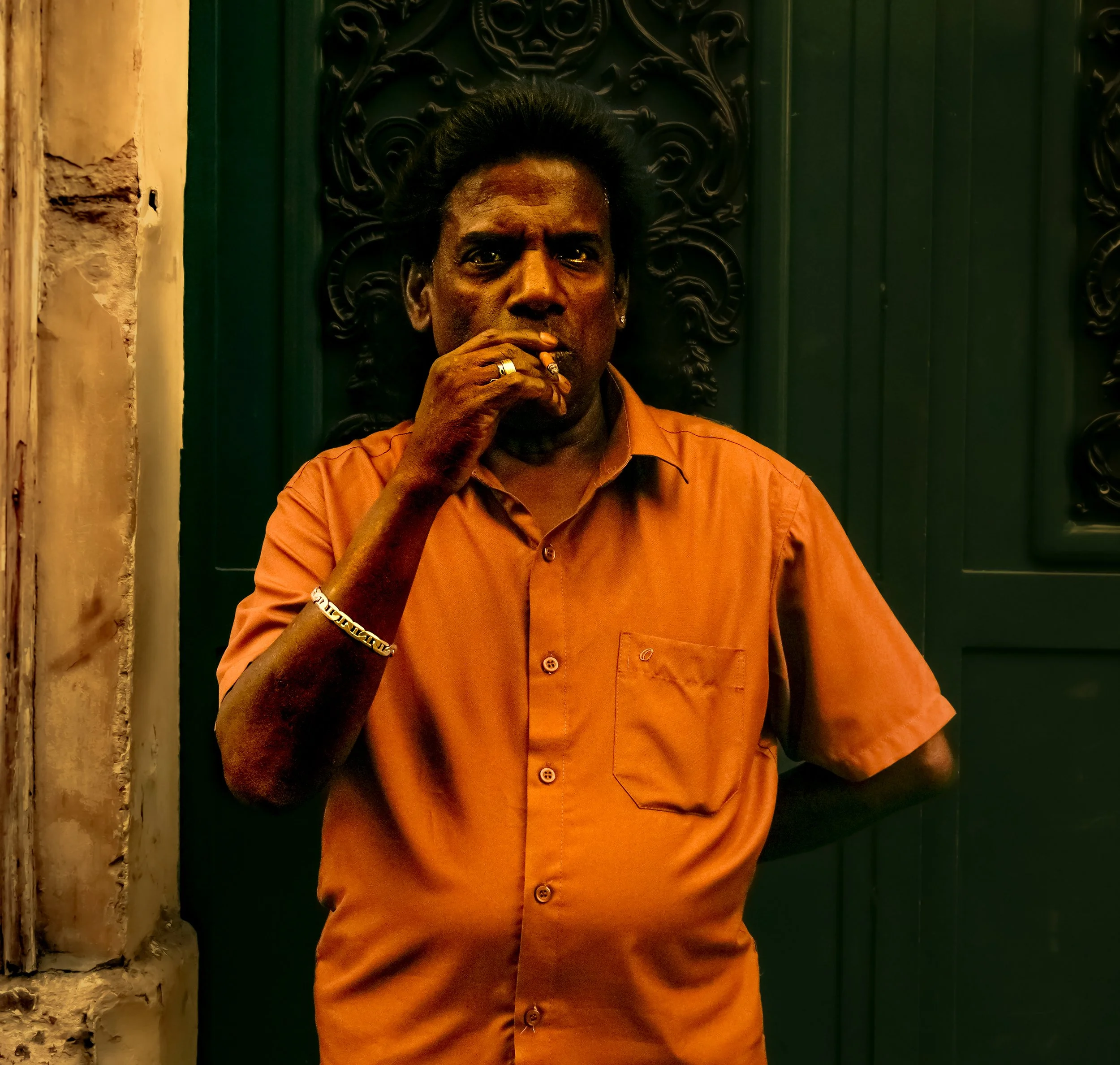 An Indian man smokes.jpg