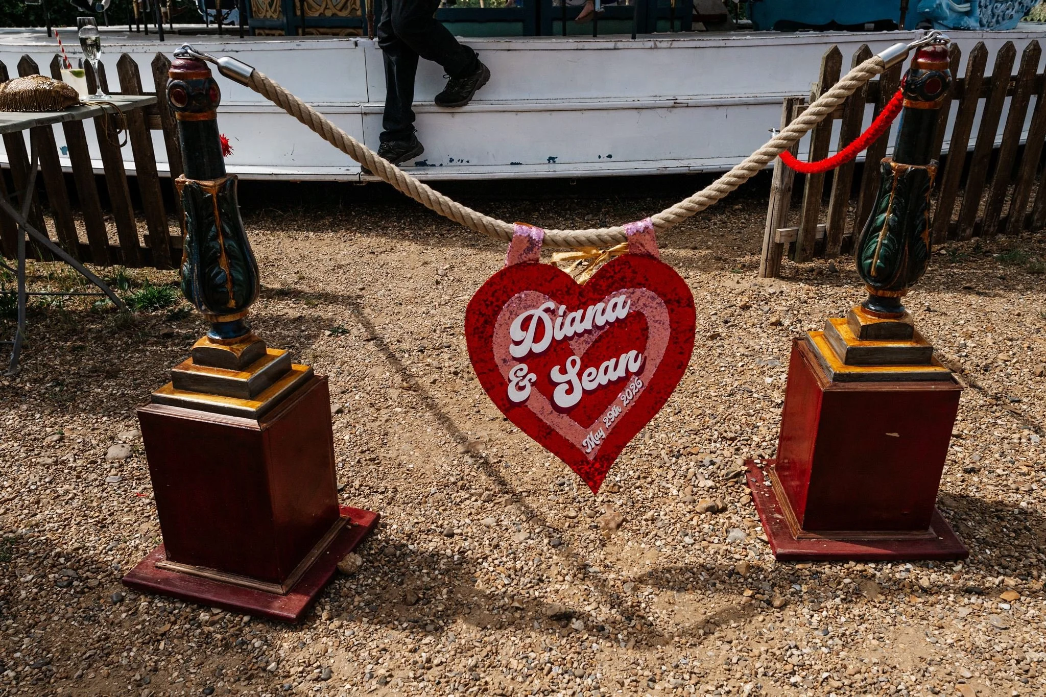 Personalised red Diana and Sean heart sign hanging beside the Preston Court carousel