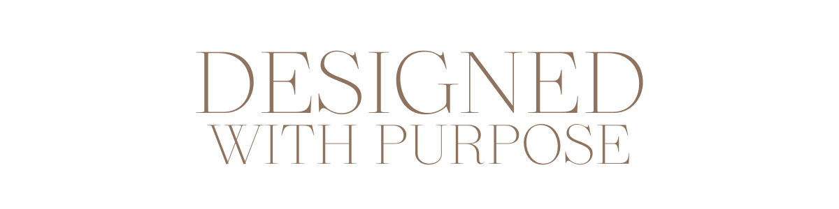 Text that reads 'Designed with Purpose' in elegant brown font on a white background.