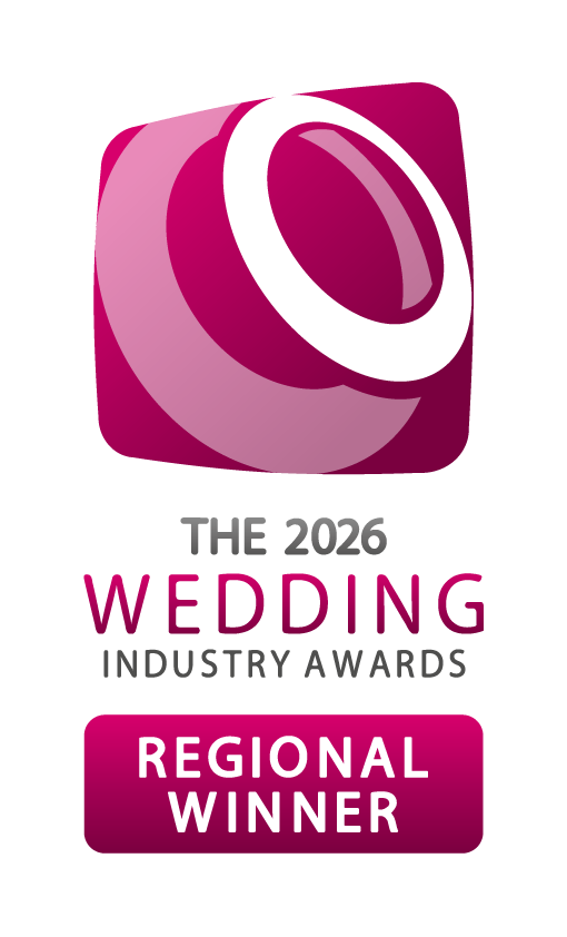 Logo with a stylized ring and the words "Regional Winner" in purple and pink colors.