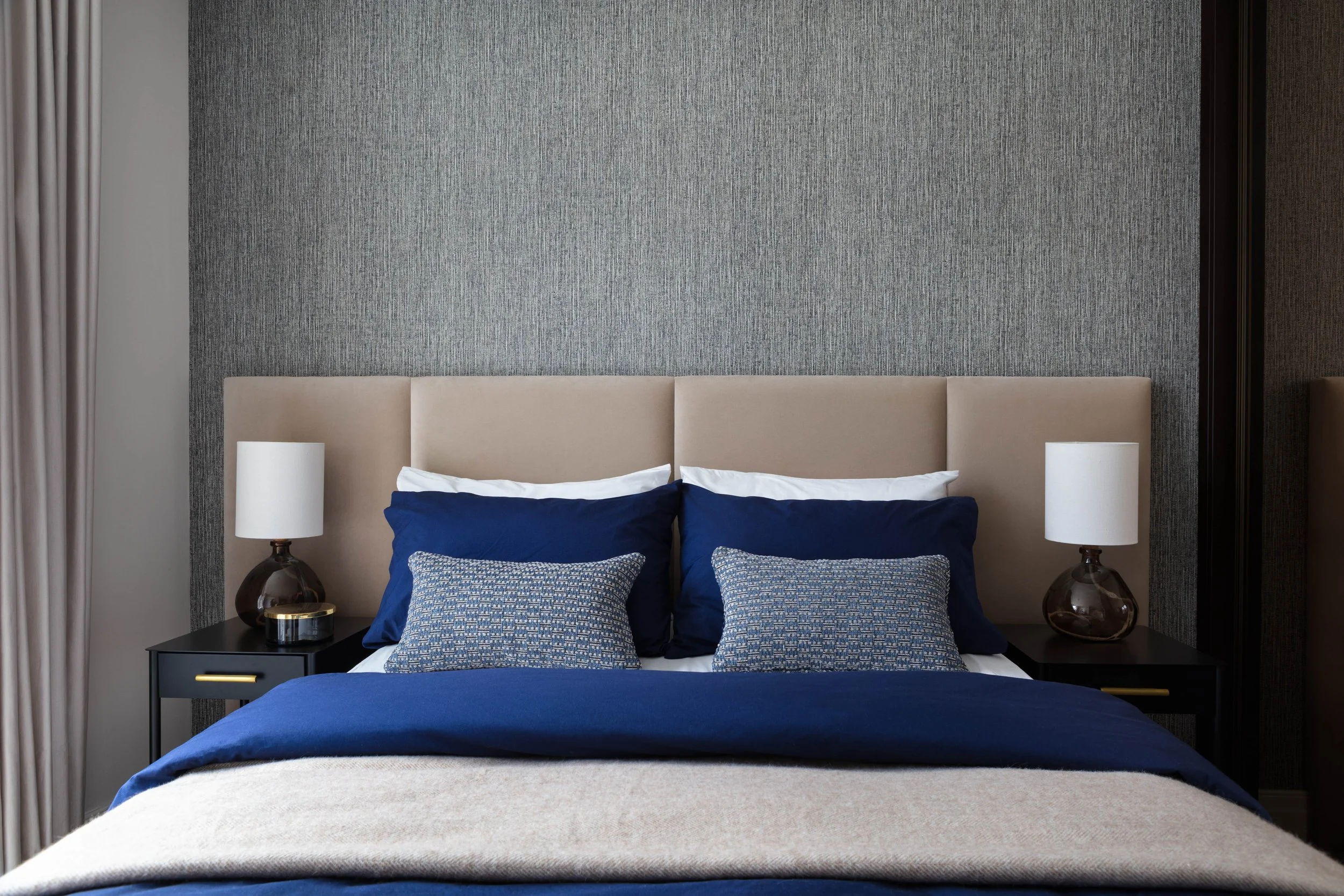 Interior designed master bedroom at a show apartment in west london