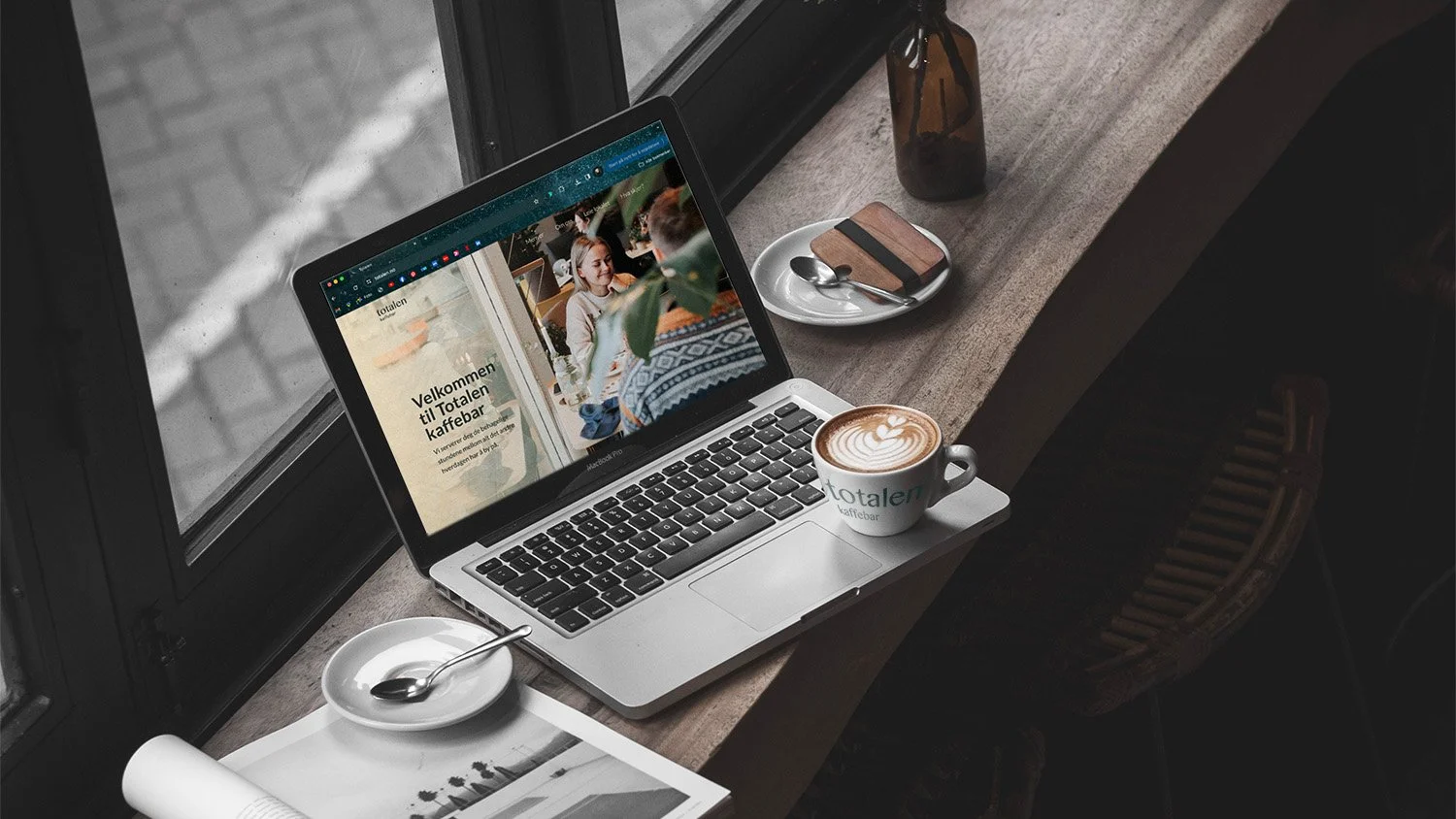 MacBook Pro in Cafe Mockup.jpg