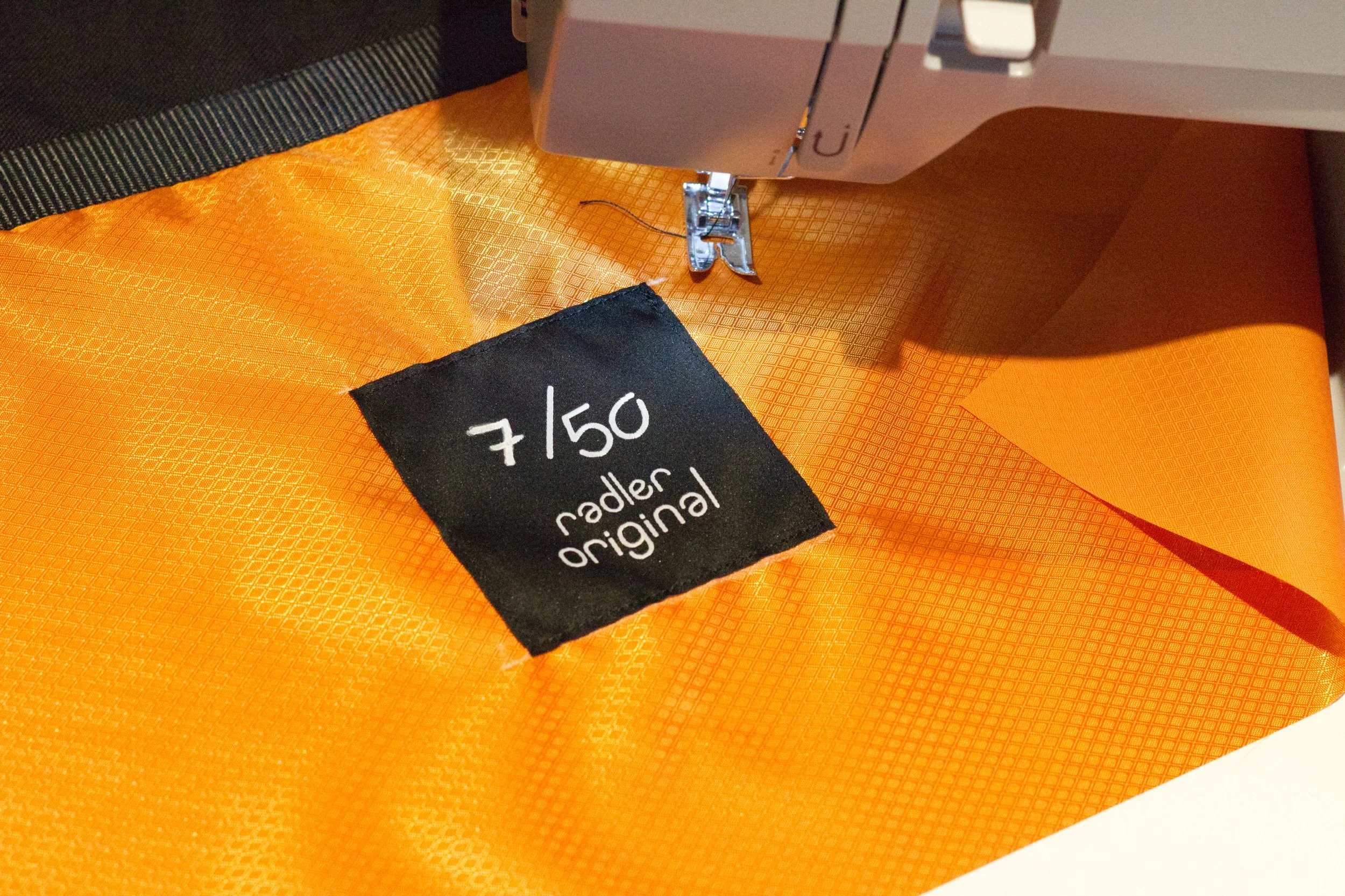 an image of a lable saying 7 out of 50 on fabric.