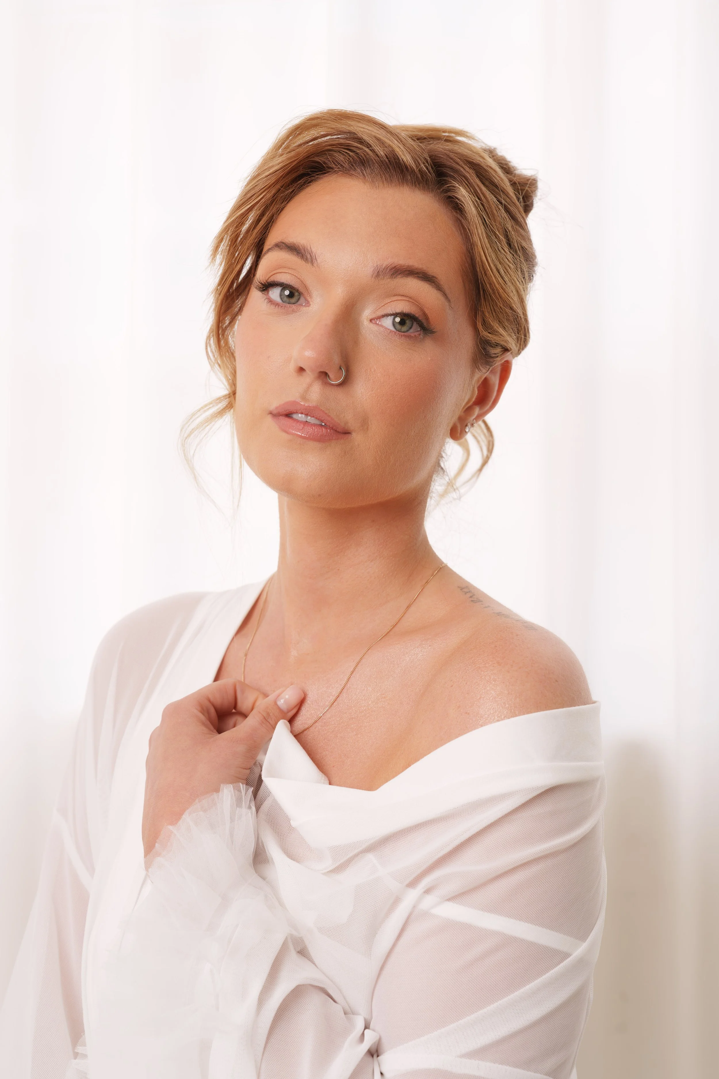 bridal makeup blonde women in white