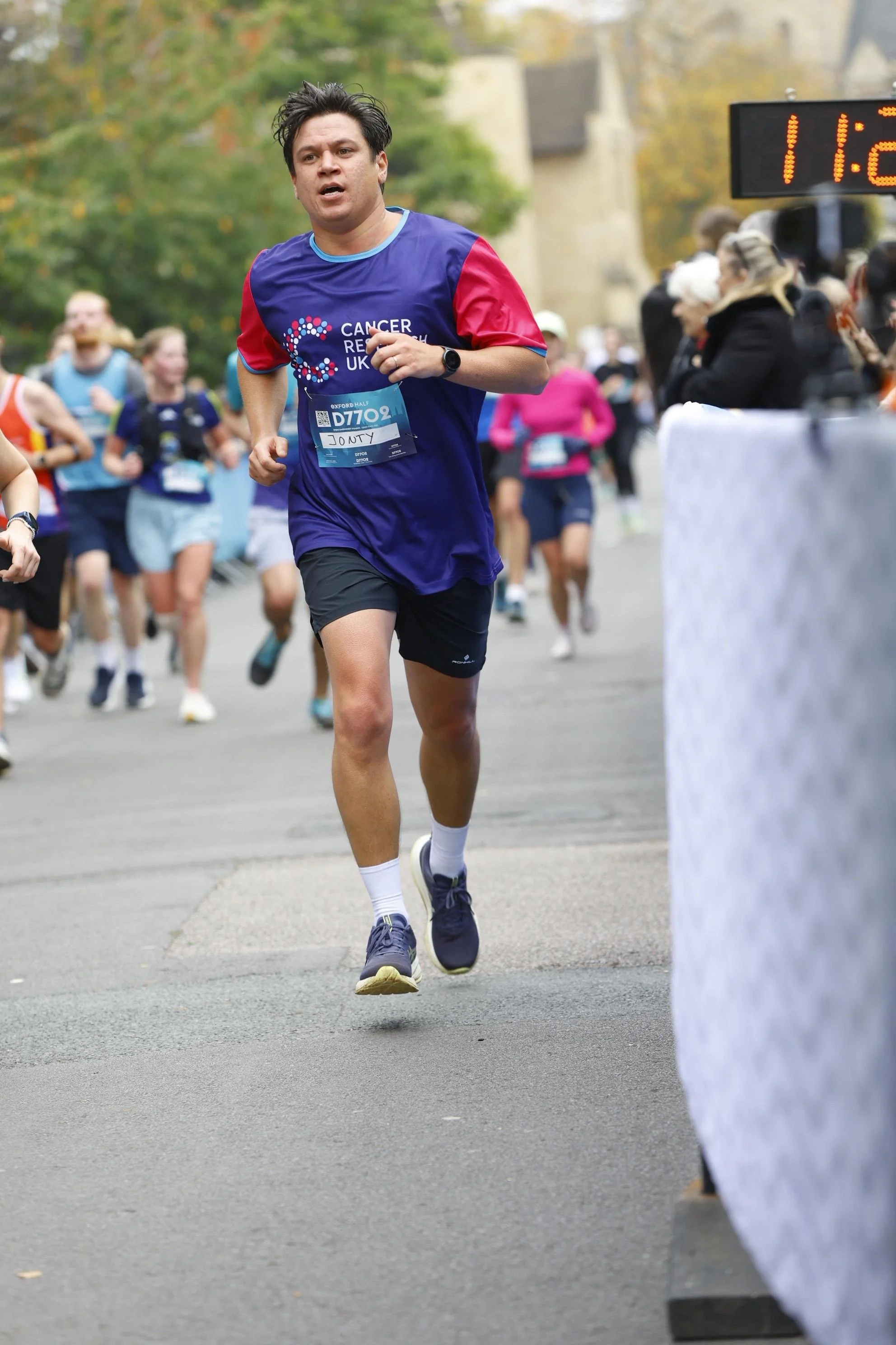 Client Spotlight: Johnathan Marsh Smashes Oxford Half Marathon for Cancer Research UK