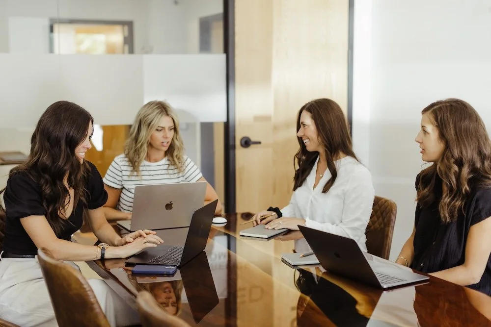 Mix Creative Group team collaborating in a conference room