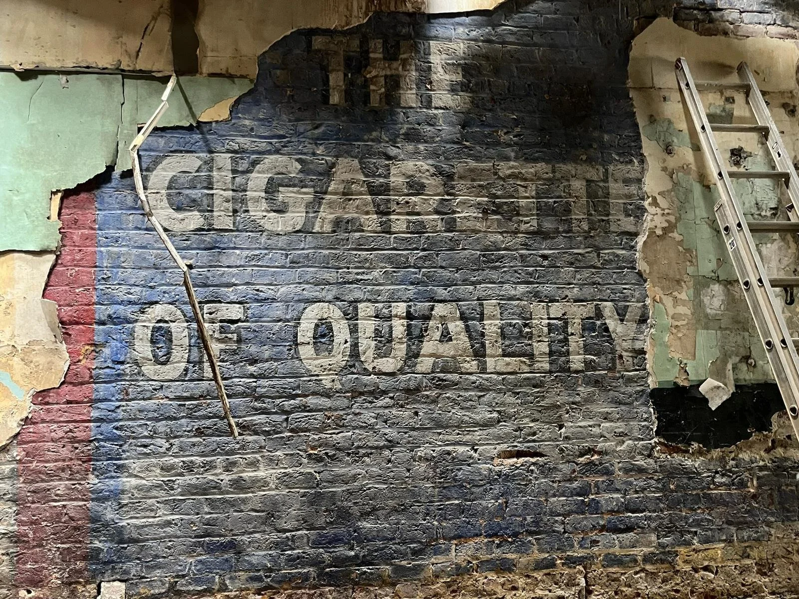 We believe that every brick and beam carries a narrative waiting to be explored. In a world where many buildings are repurposed with modern intentions, this one stood resolute, beckoning us to listen. To our amazement, an immaculate piece of advertis