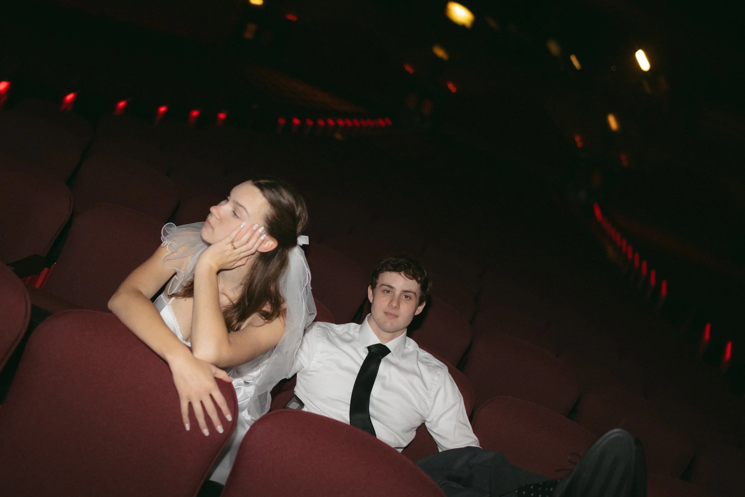Engagement session, Chicago Theater, Illinois couple posing in vintage theather