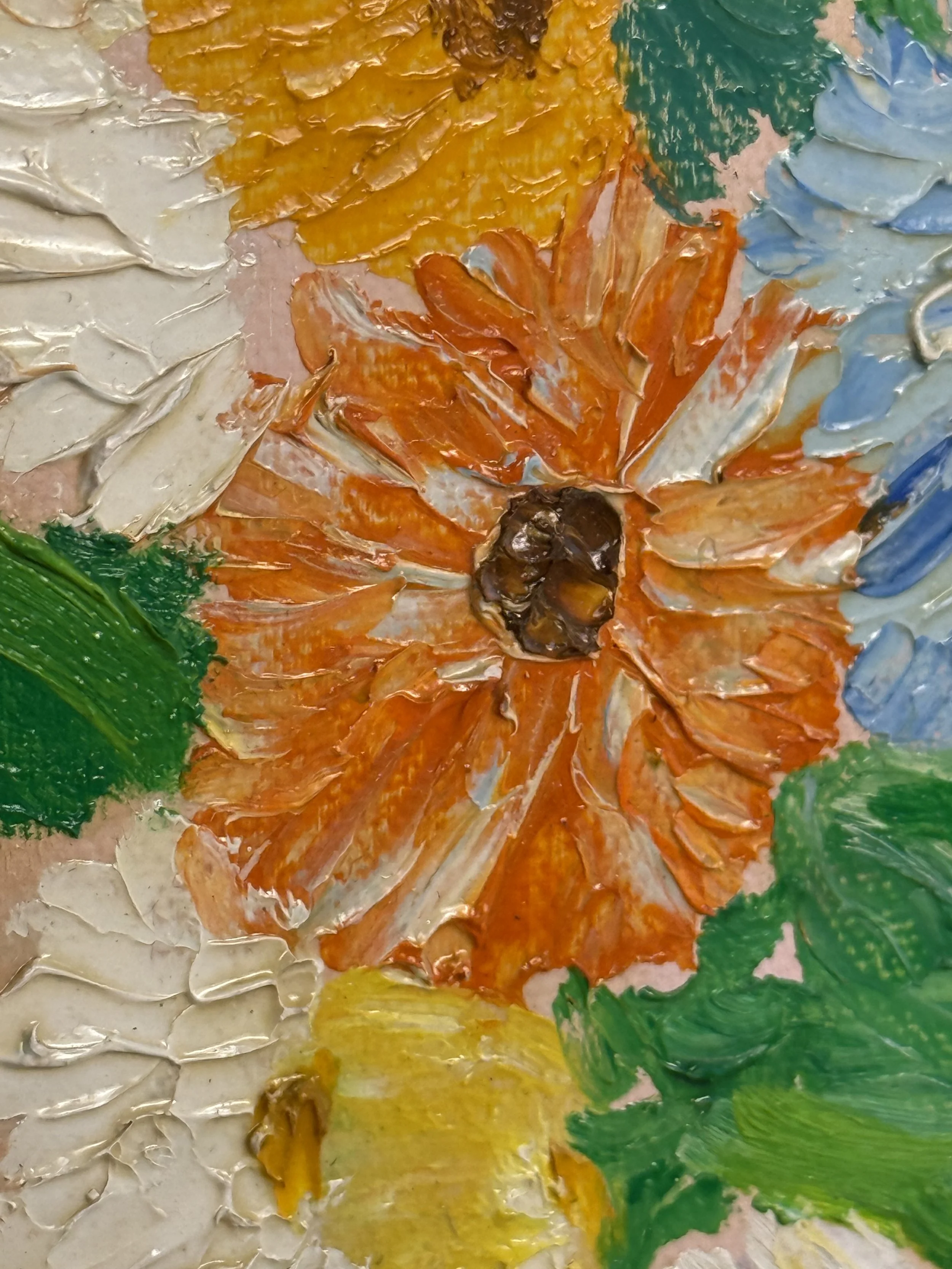 Macro view of orange and yellow impasto flowers from a 1996 naïve folk art oil painting by J.J. Martel