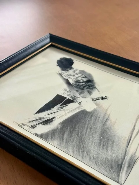 Angled top view of framed artwork highlighting depth of frame and glass, modernist wall art presentation