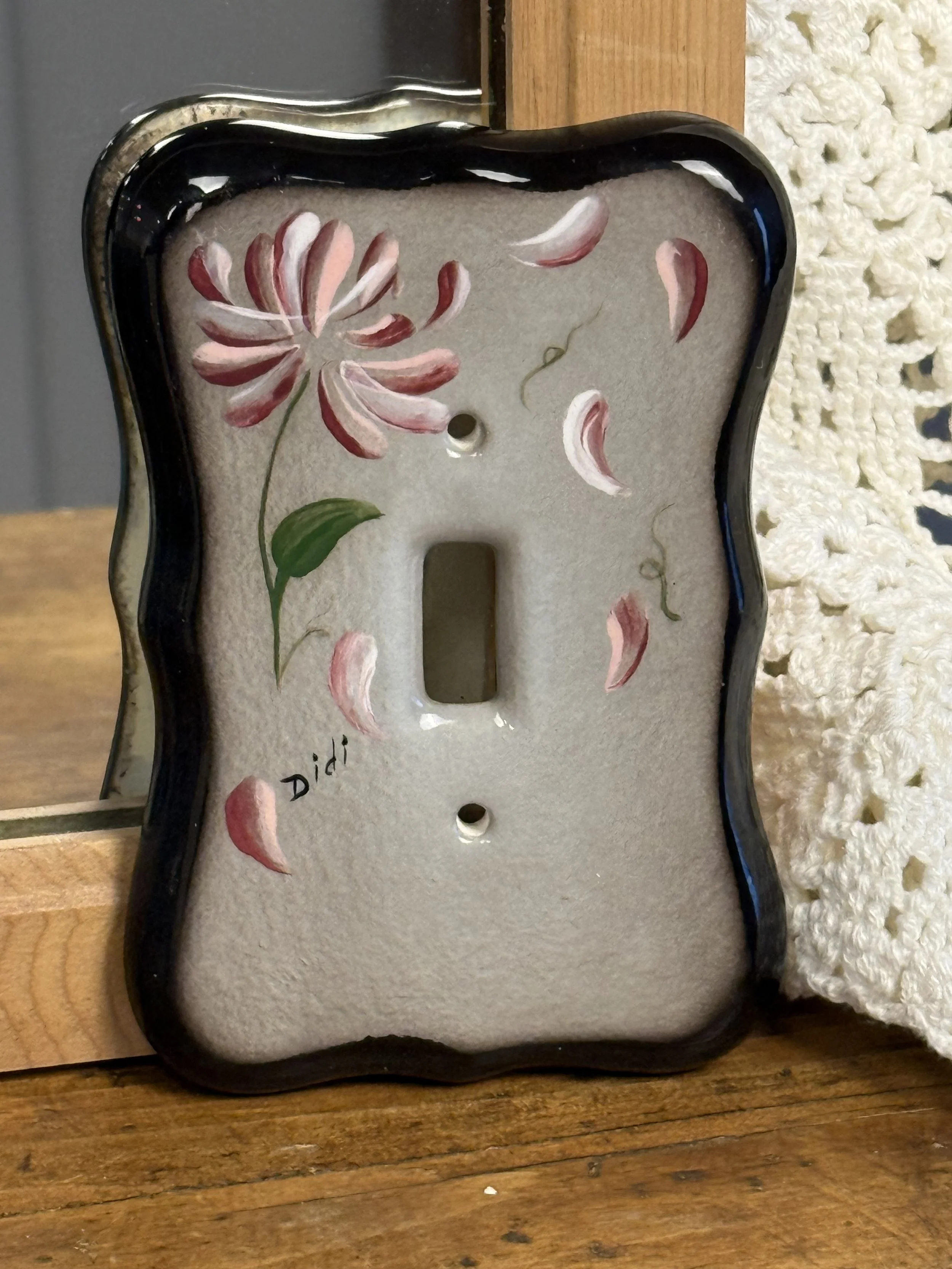 Single ceramic light switch plate with hand-painted pink flower on grey ground, glossy finish, vintage floral wall decor