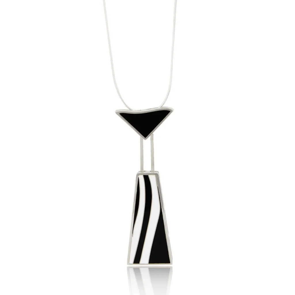 Necklace with a modern black and white geometric pendant