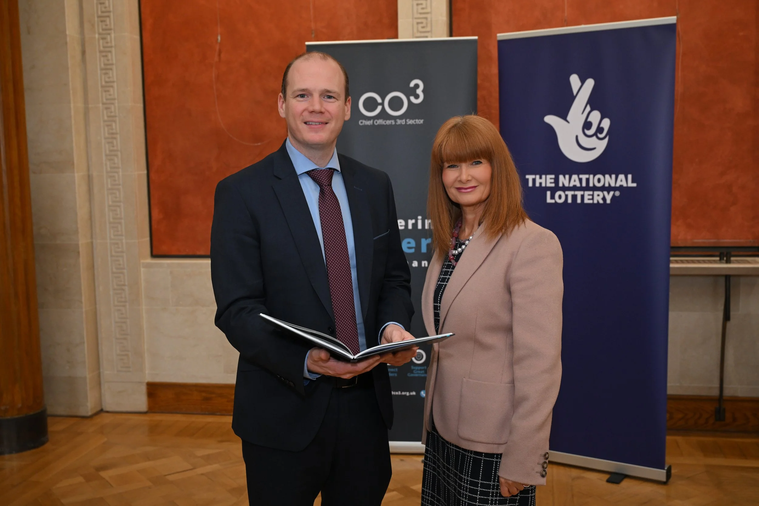 CO3 Marks 40 Years of Leadership with Commemorative Book Launch at Stormont, Supported by The National Lottery