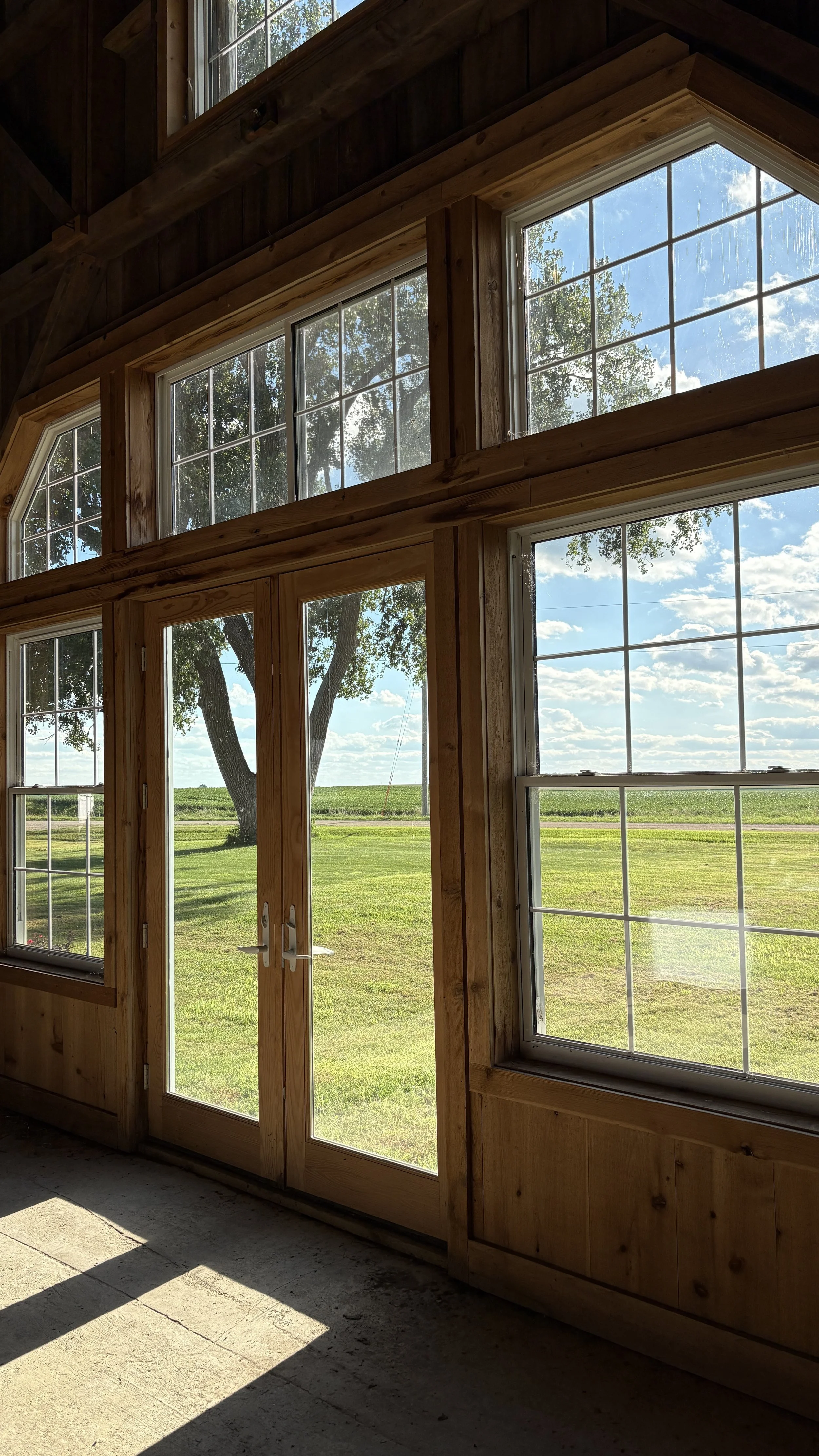 Large glass double doors, west facing sunset.