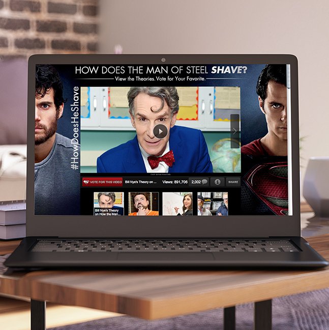 Gillette “How Does He Shave” digital campaign homepage screenshot with Bill Nye, Superman imagery, and interactive video hub driving fan engagement around Man of Steel movie partnership.