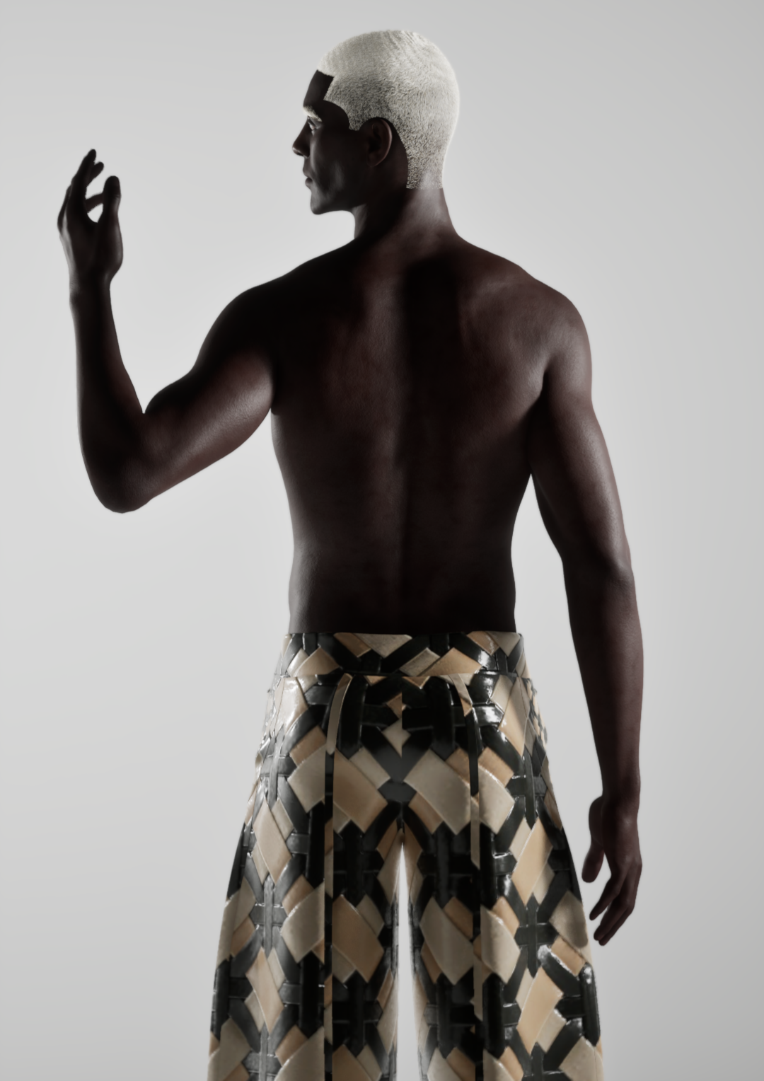 A shirtless person with dark skin and platinum blonde hair styled flat on top, facing sideways, raising one hand near their face. They are wearing baggy, patterned black and beige pants with a geometric design, against a plain light background.