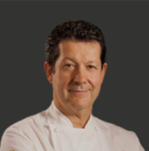 A Photo of Gerald Bertholon on a grey background