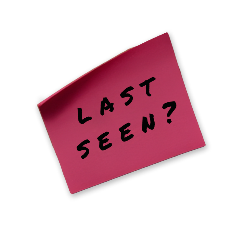 Pink note with the words 'Last Seen?' written in black, tilted on a black background.