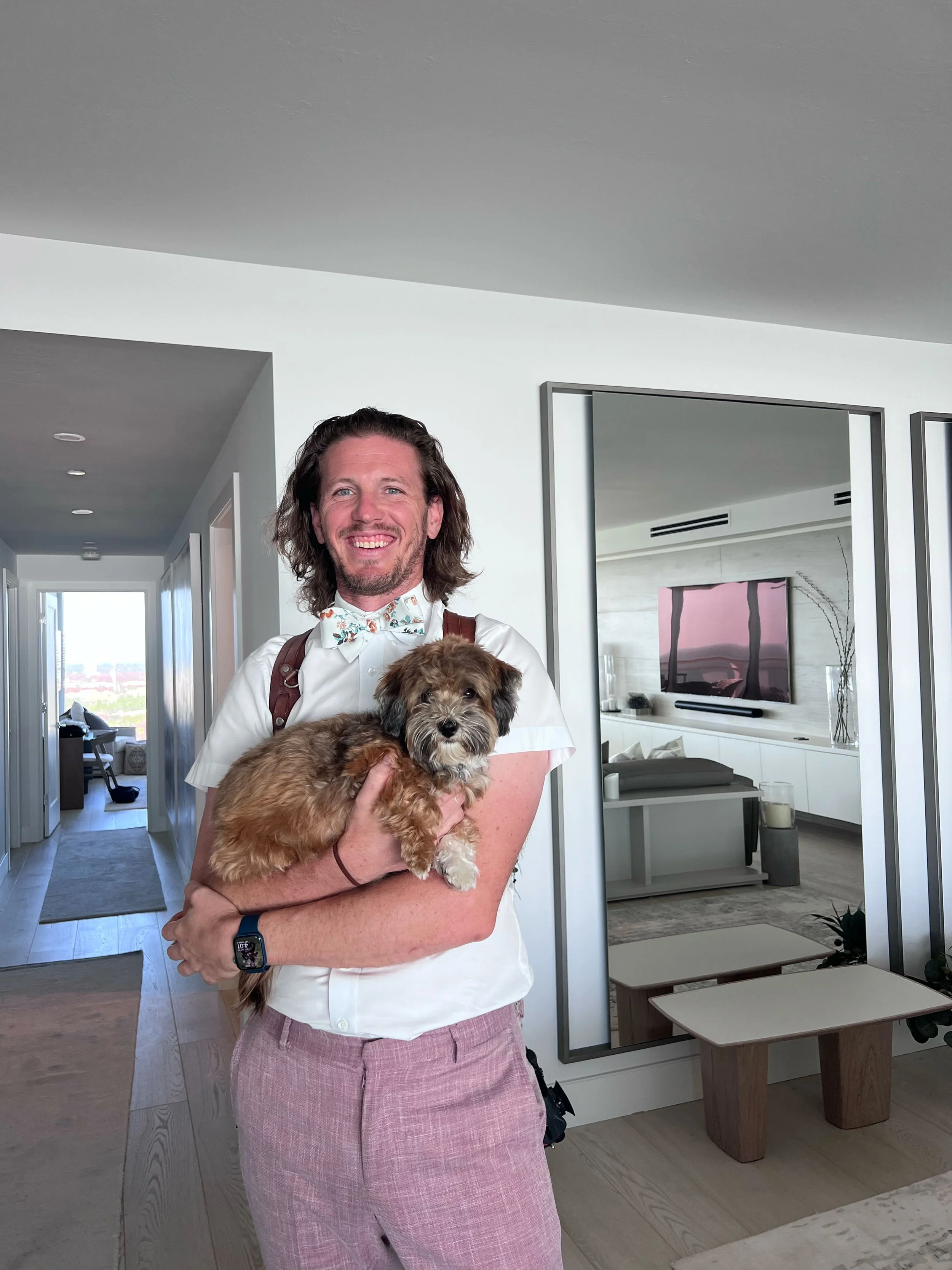 Sometimes you need to take photos. Sometimes you need to take care of the clients' dog.