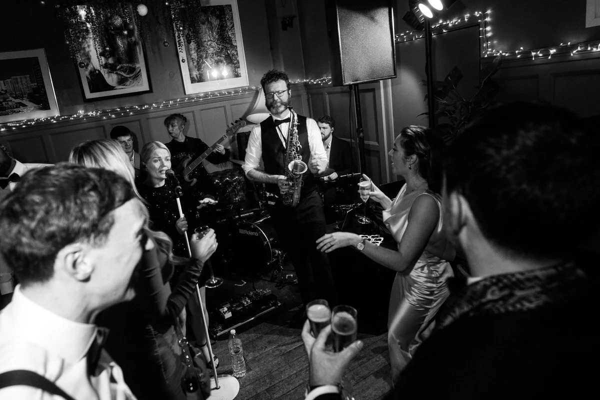 Guests enjoying live New Year’s Eve wedding music from NeoRoots at The Larrik in London.