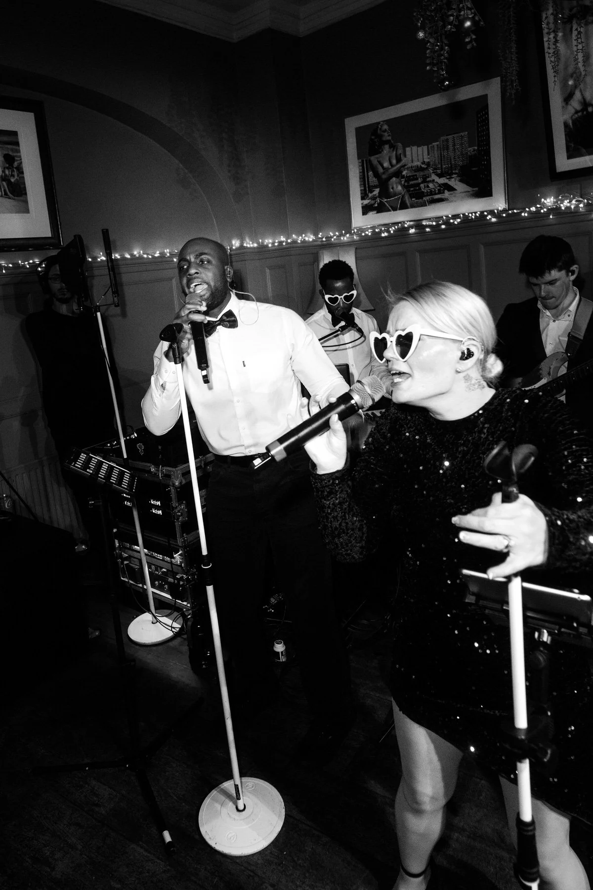 NeoRoots singers performing live at a luxury New Year’s Eve wedding in London with guests on the dancefloor.