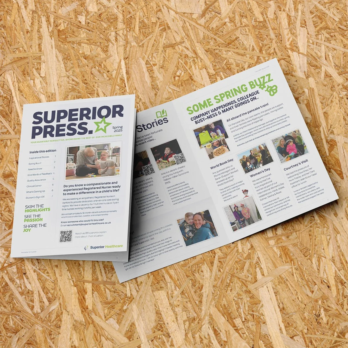 Open magazine with articles, photos, and headlines, placed on a textured wooden surface.