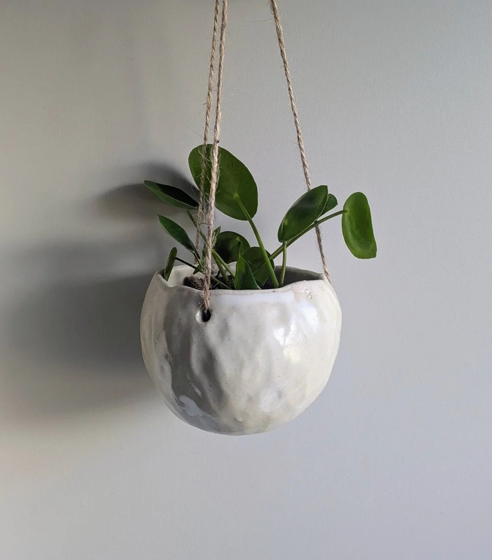A pinch pot hanging plater made in beginners pottery class