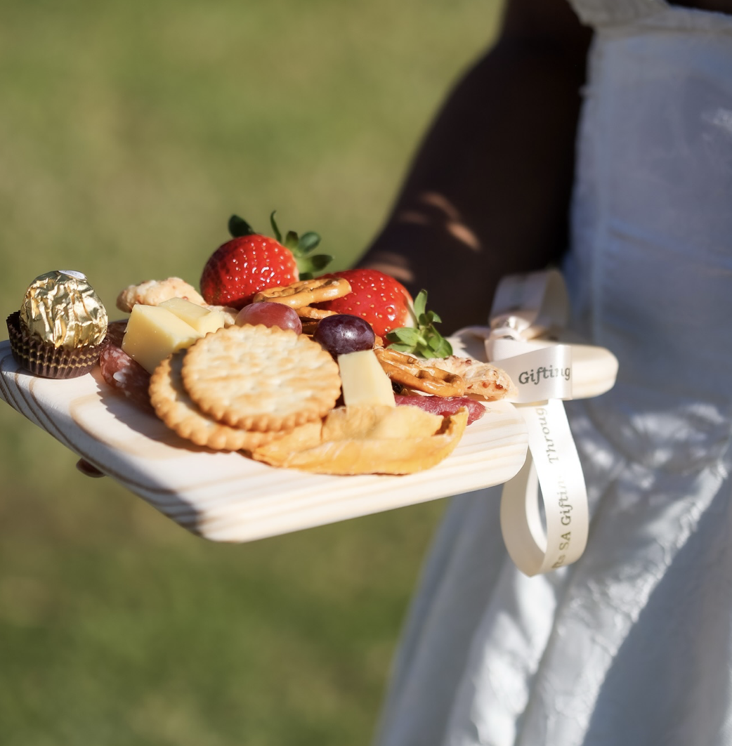 Luxury charcuterie cart setup with artisan meats, cheeses, fruits, crackers, and grazing table styling for weddings and private events in Sherman TX.