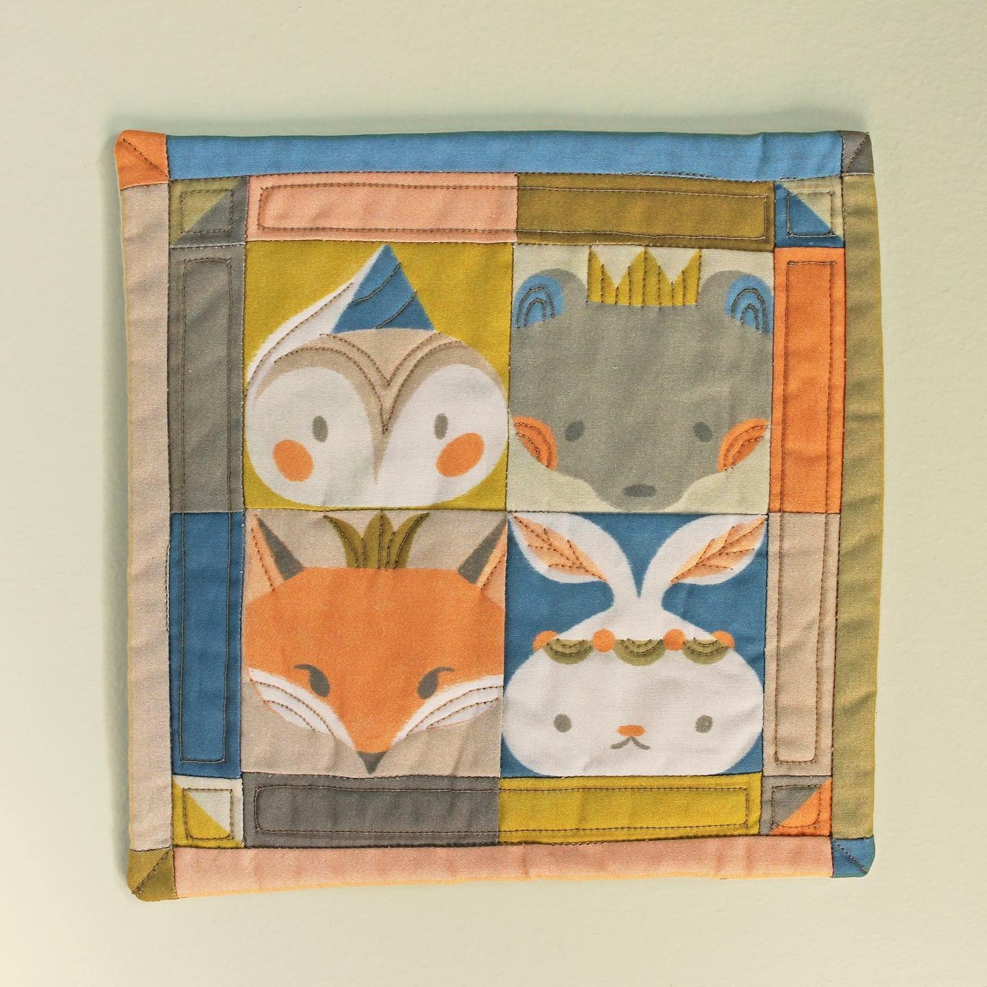 🦉🐰🐻🦊
The next piece in my Woodland Theater collection is the Fauna Sham! This is a miniature tapestry which I designed to look like quilted bedding. I drew the animals with geometric shapes to create a playful, patchwork look, and fabricated it b