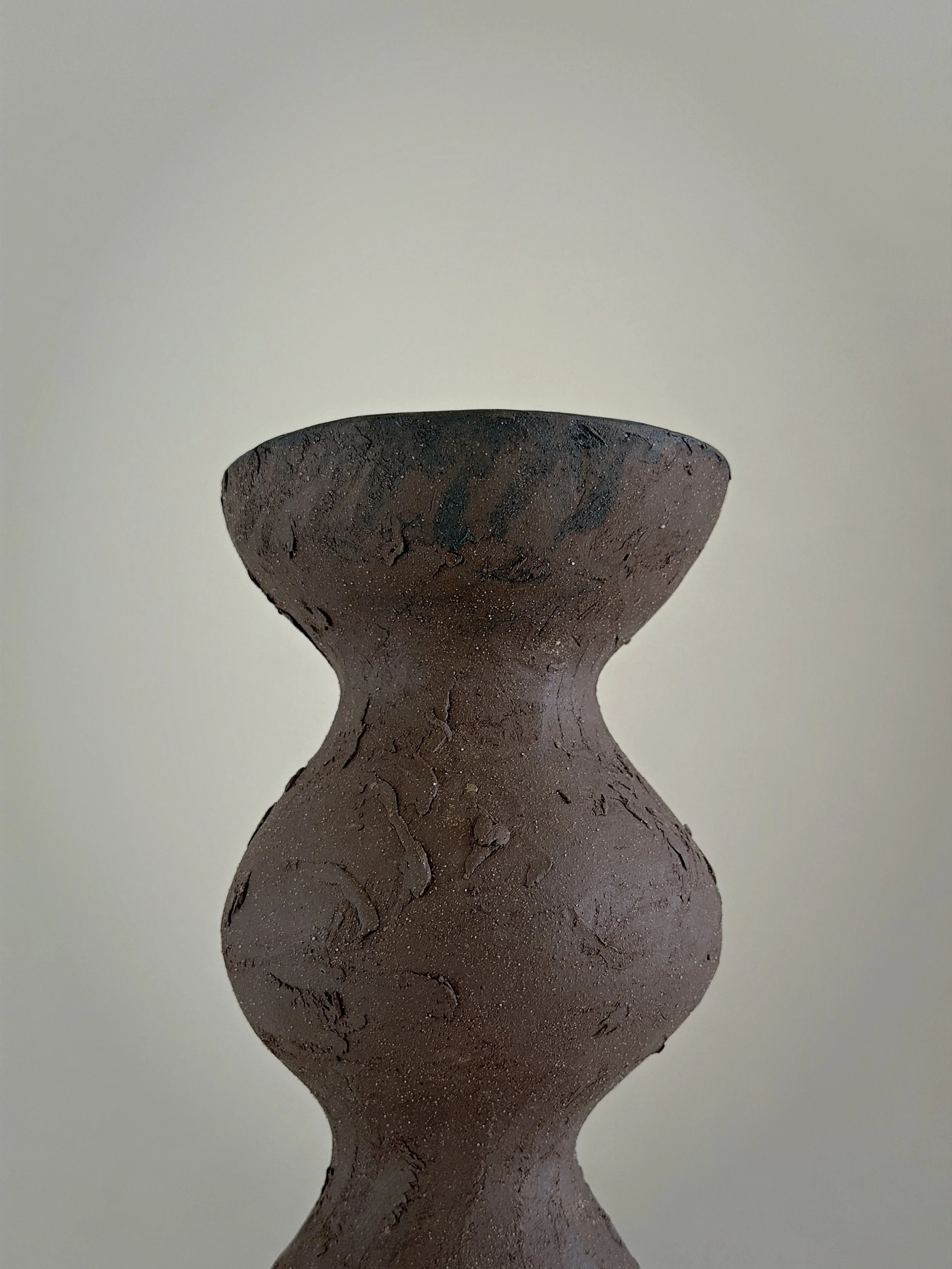 Dark Brown Totem Vase by Anastasia Babenko — with a brutalist, totem-like architectural silhouette in deep brown stoneware, original ceramic