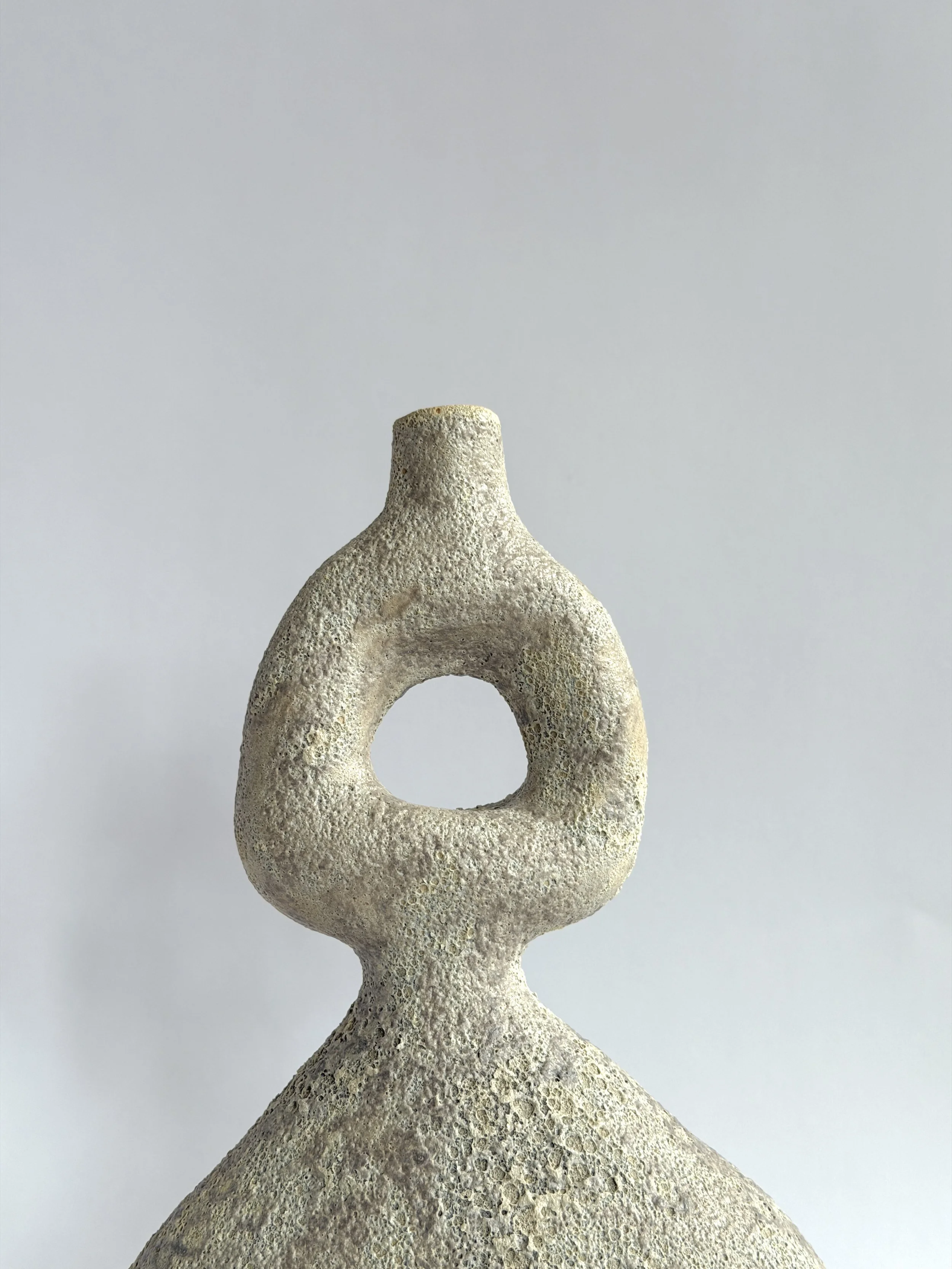 Hand-built ceramic vase set: Dancers Vase Set, of rounded forms caught mid-motion, rising to looped openings — Anastasia Babenko