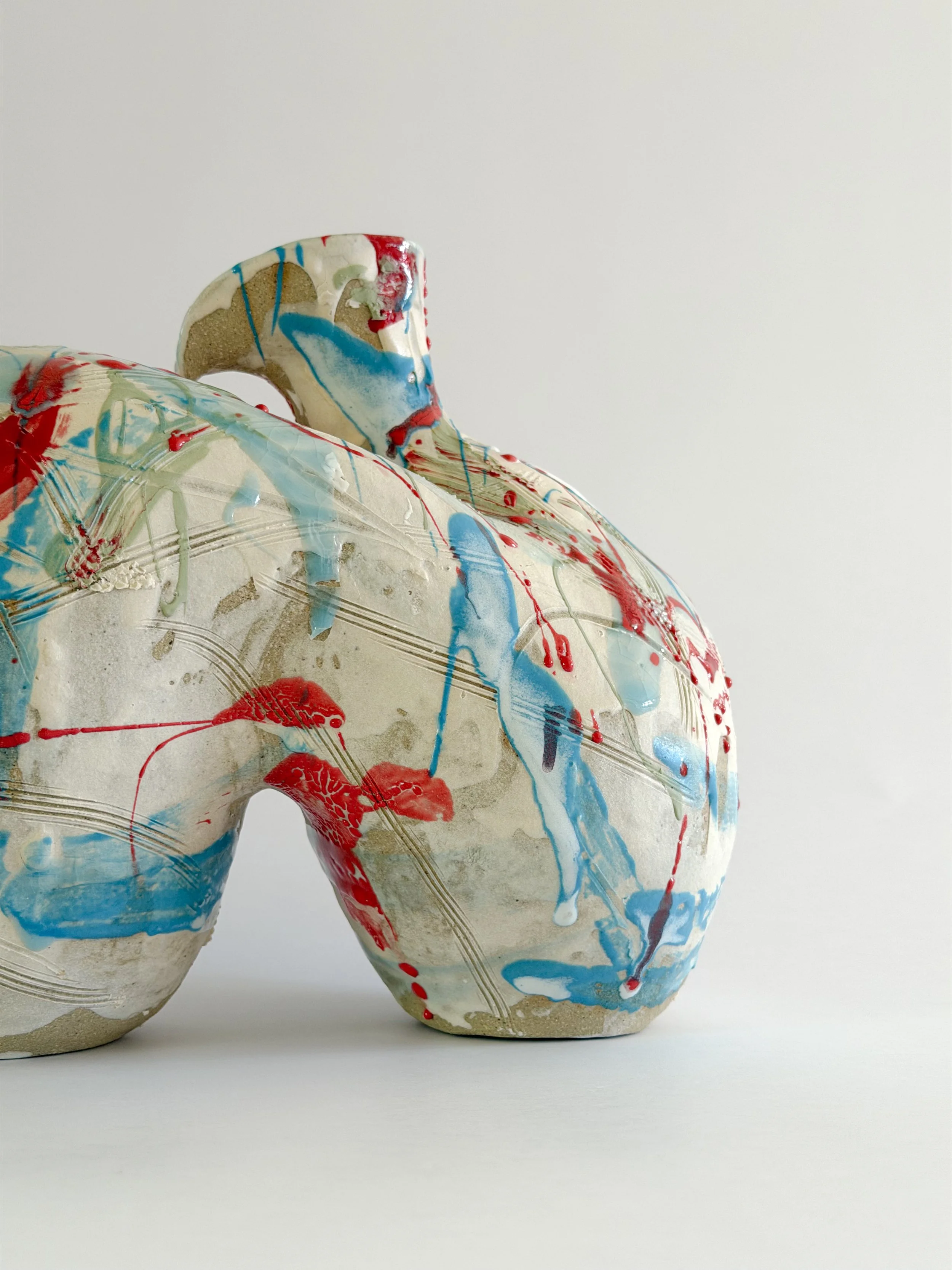 Form No. 2 by Anastasia Babenko — with runny white glaze over red, turquoise and green and fine incised lines, original ceramic art for