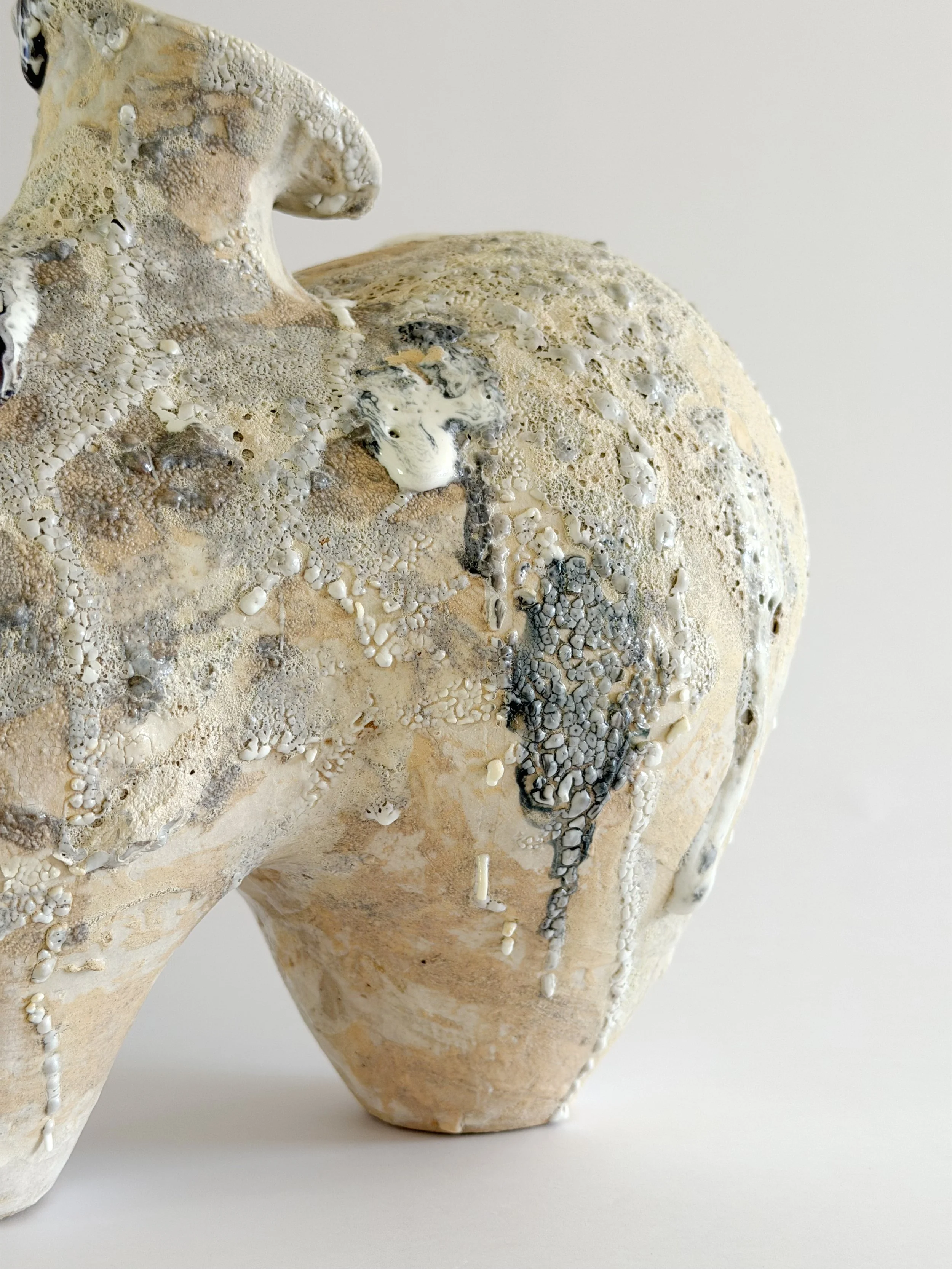 Form No. 1 by Anastasia Babenko — with two full volumes resting under a crawling, sand-colored mineral crust, sculptural decor for design-led