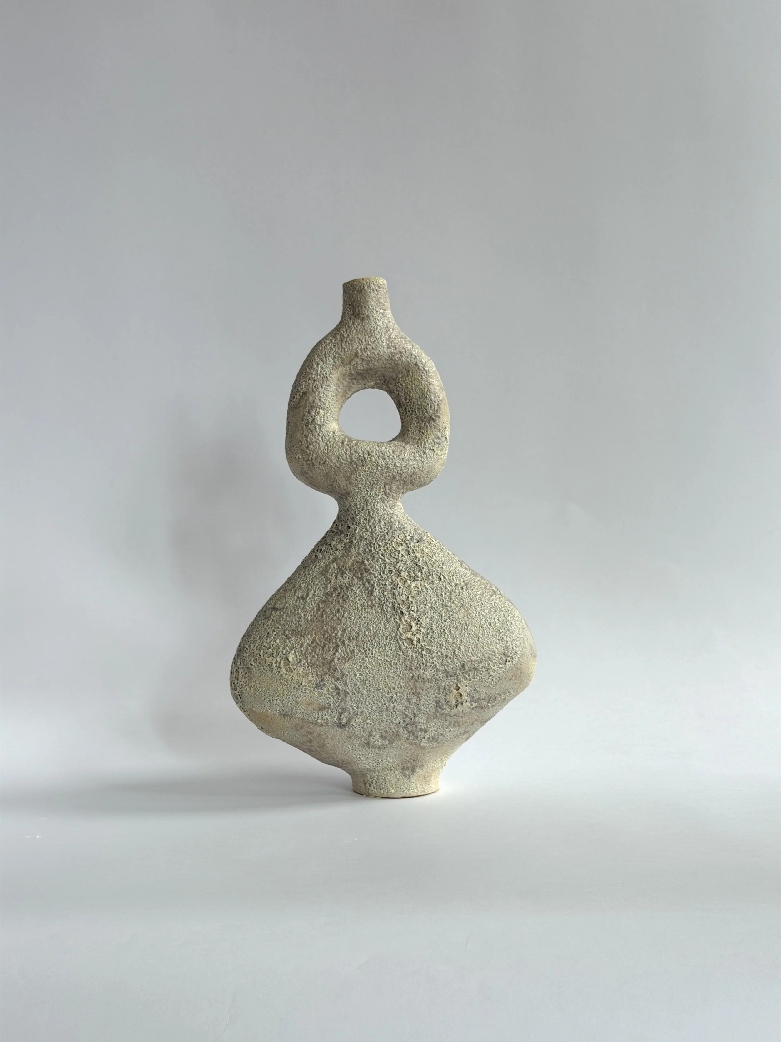 Dancers Vase Set: of rounded forms caught mid-motion, rising to looped openings, a sculptural ceramic vase set by Anastasia Babenko