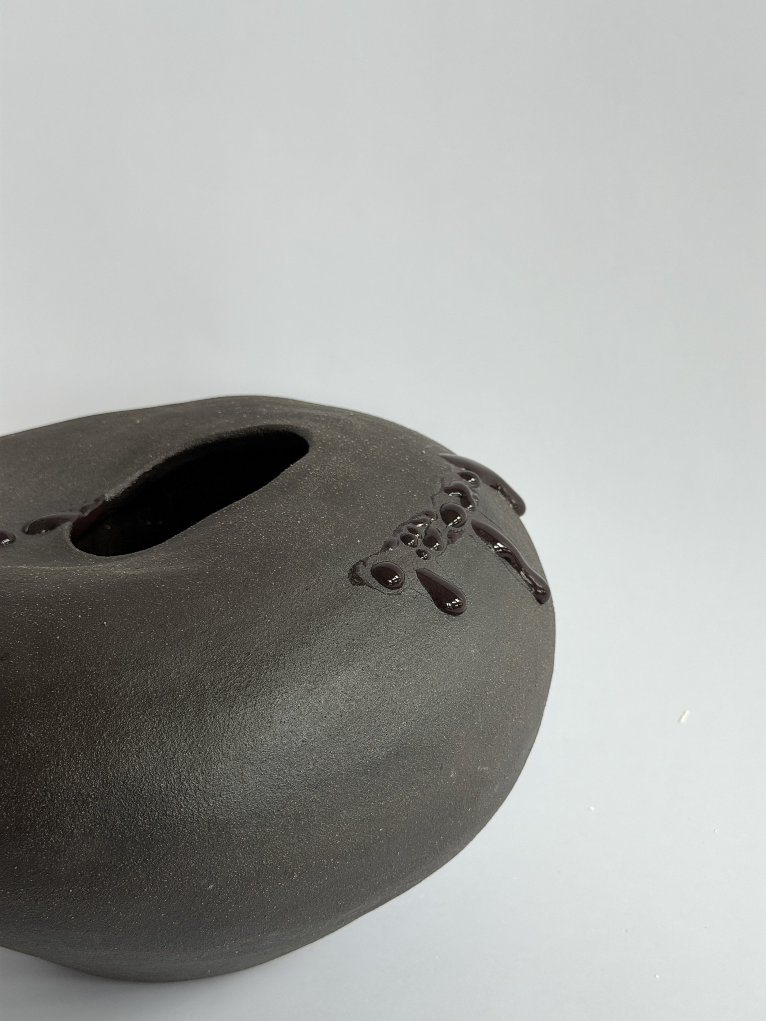 Whispering Stone — hand-built ceramic vase shaped like a smooth river stone, organic and calming, by Anastasia Babenko
