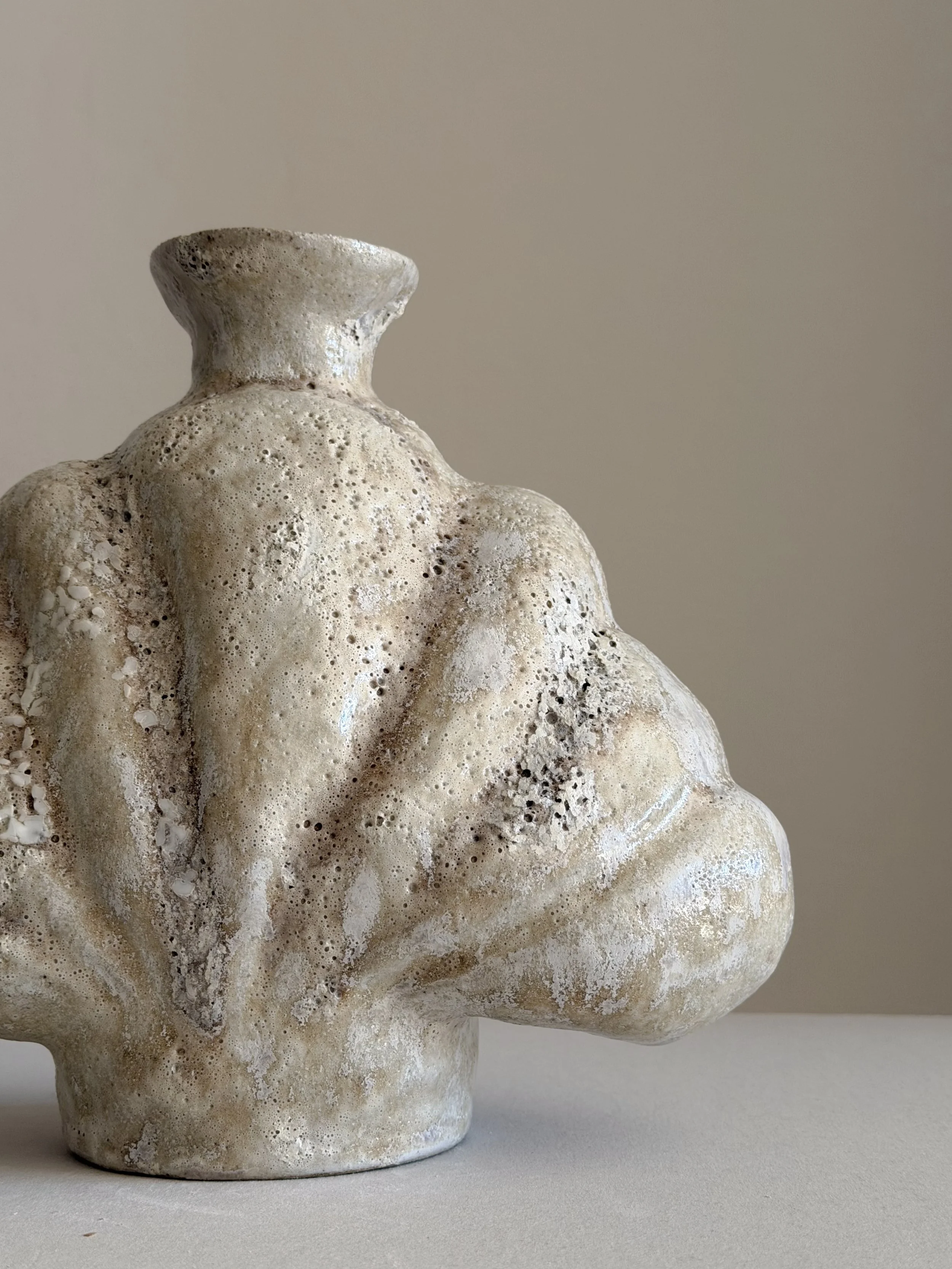 Hand-built ceramic vase: Shell in Beige, shaped like a deep-sea shell, full and protective, in soft beige stoneware — Anastasia Babenko